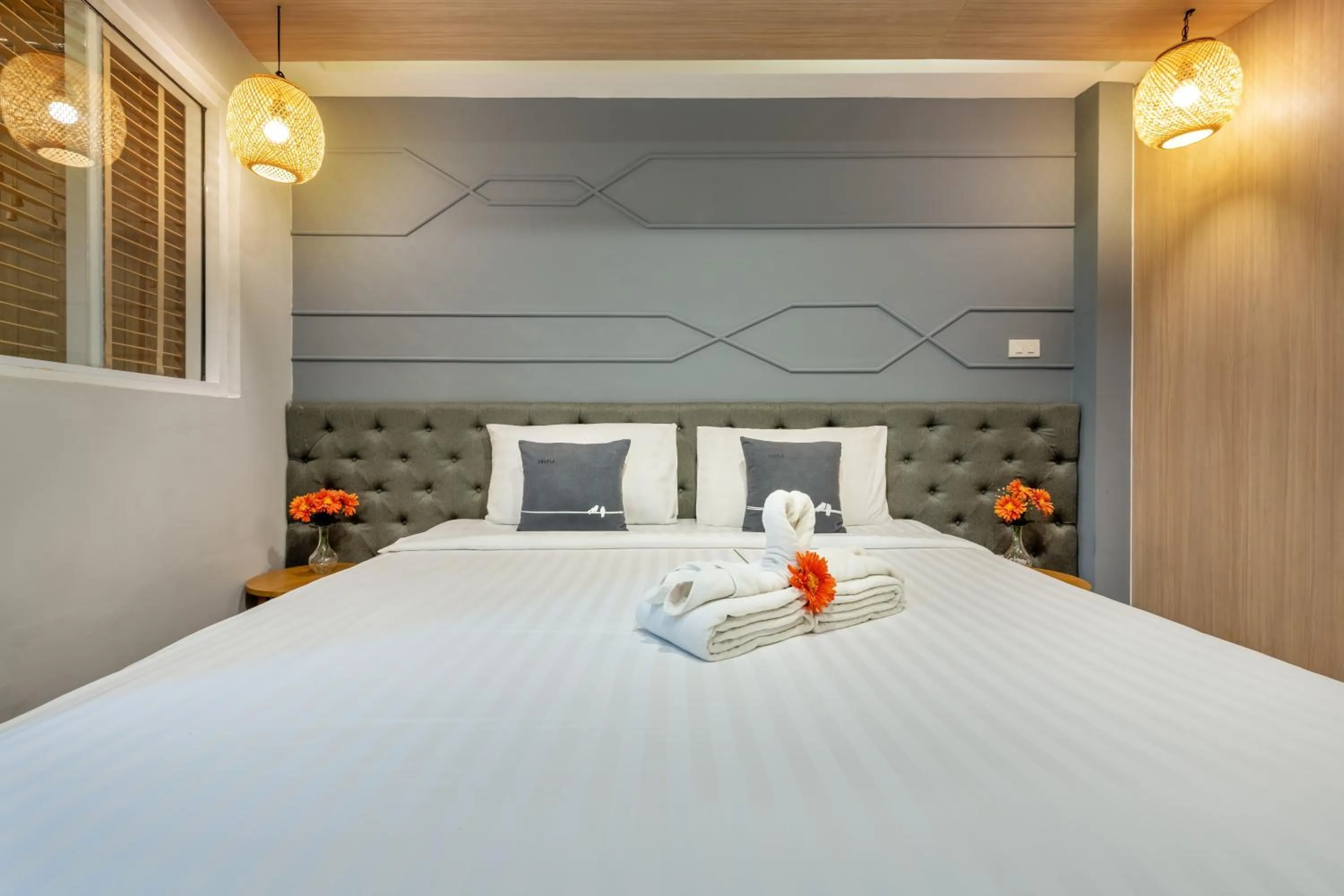 Bed in Tori Prestige Bangkok Hotel