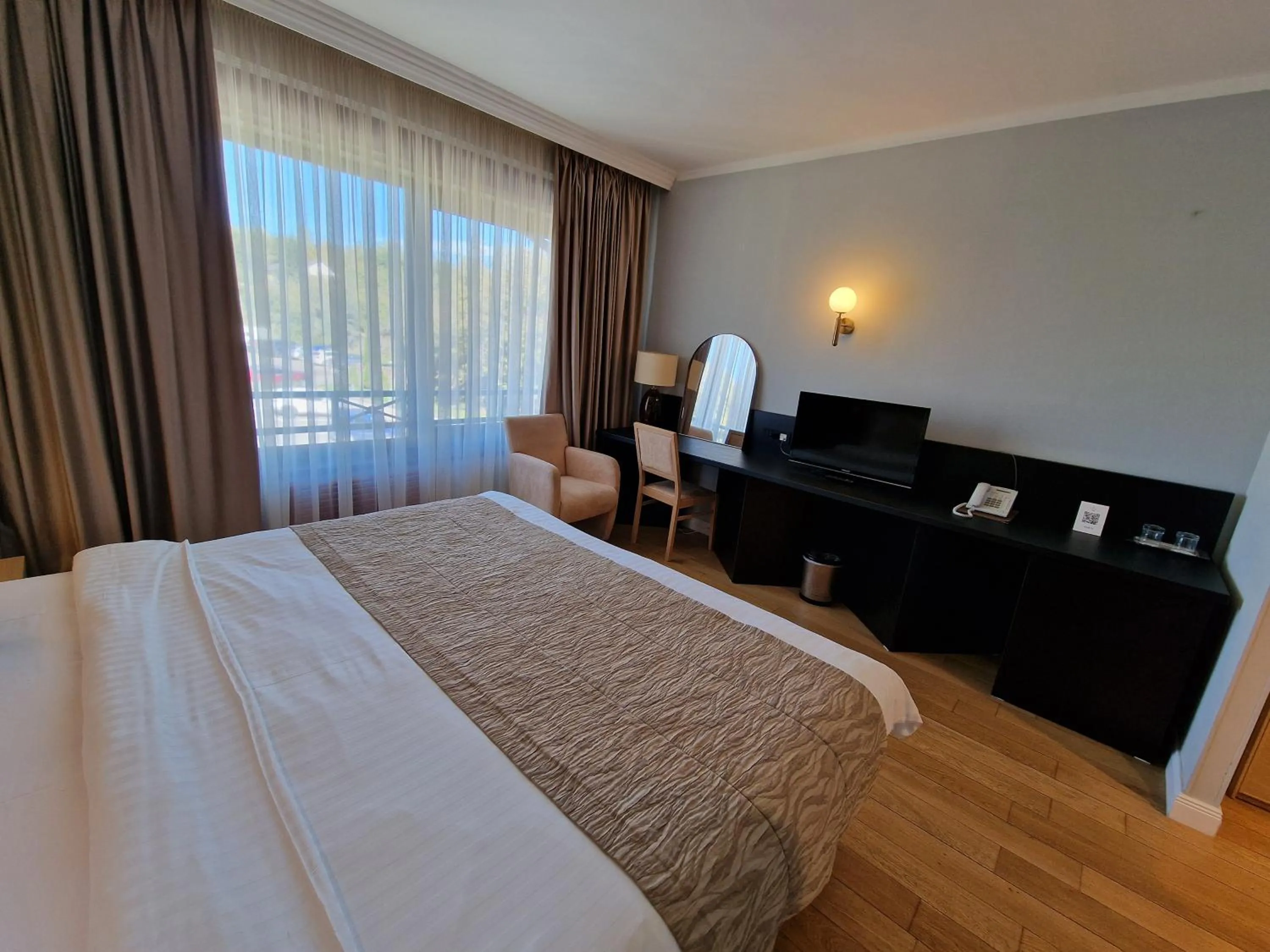 TV and multimedia, Bed in Hotel Sunny Hill