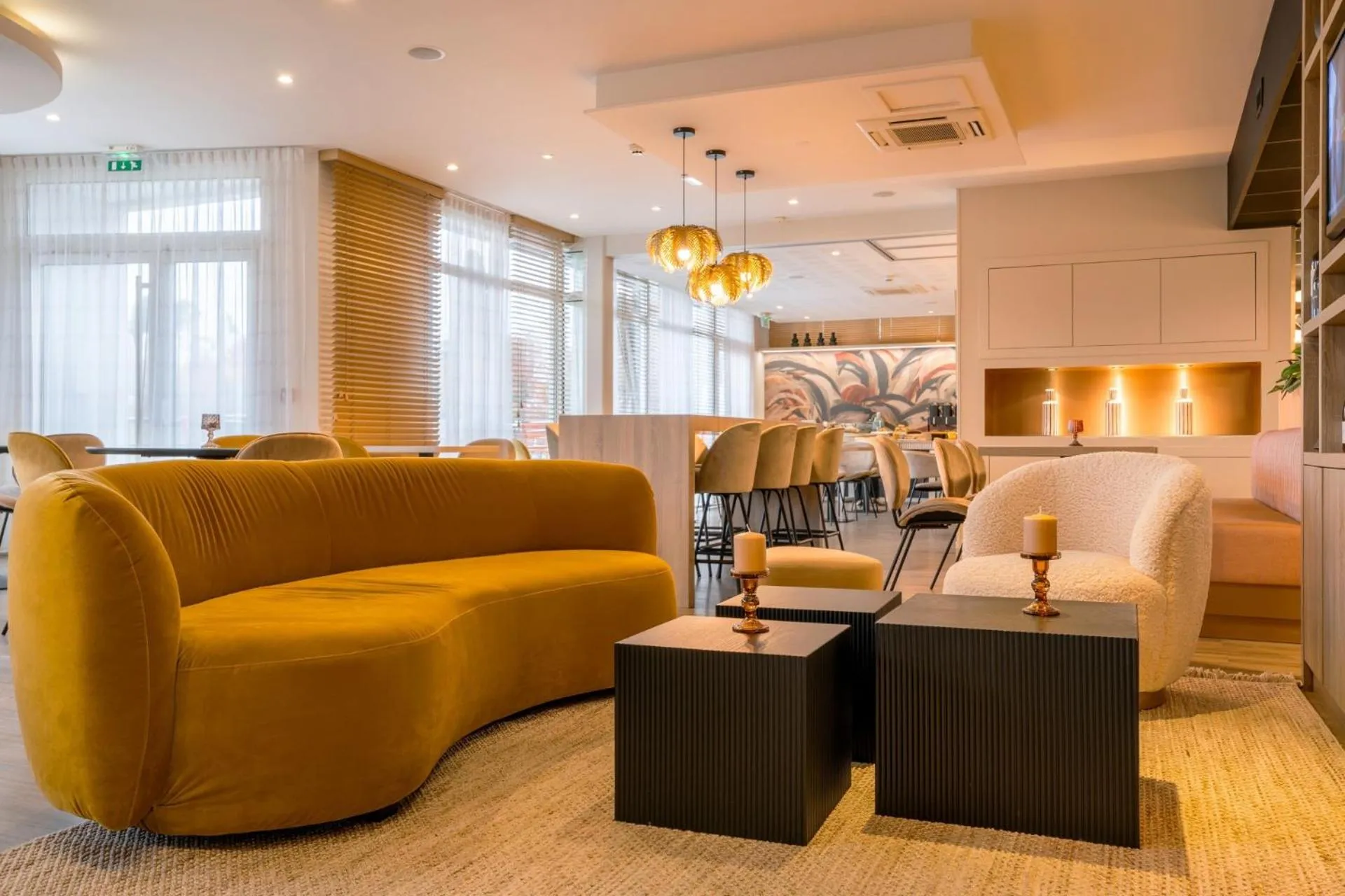 Communal lounge/ TV room in Kyriad Prestige Vannes Centre-Palais des Arts