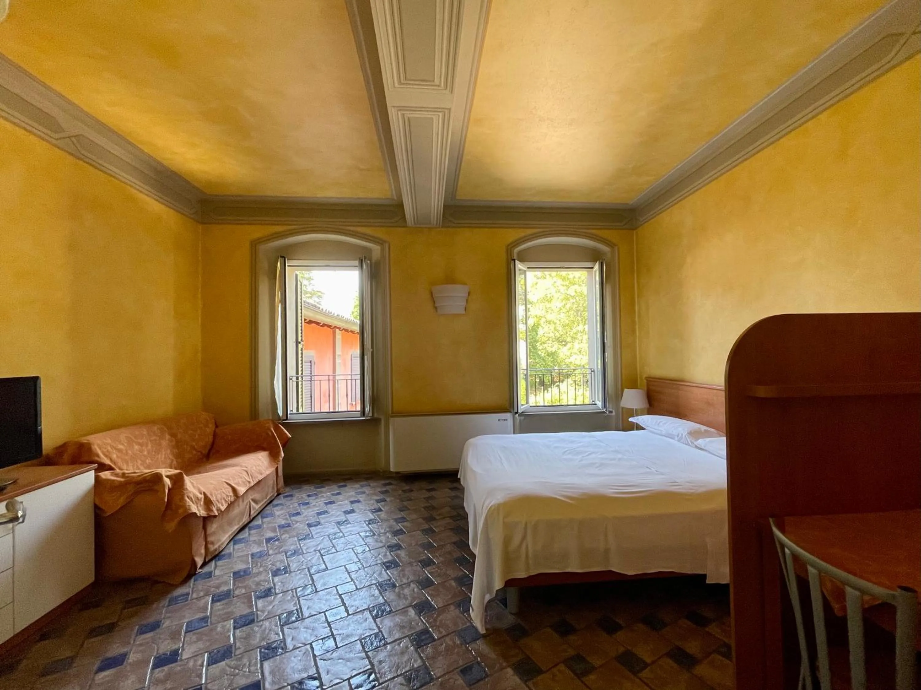 Living room, Bed in Residence Corte della Vittoria