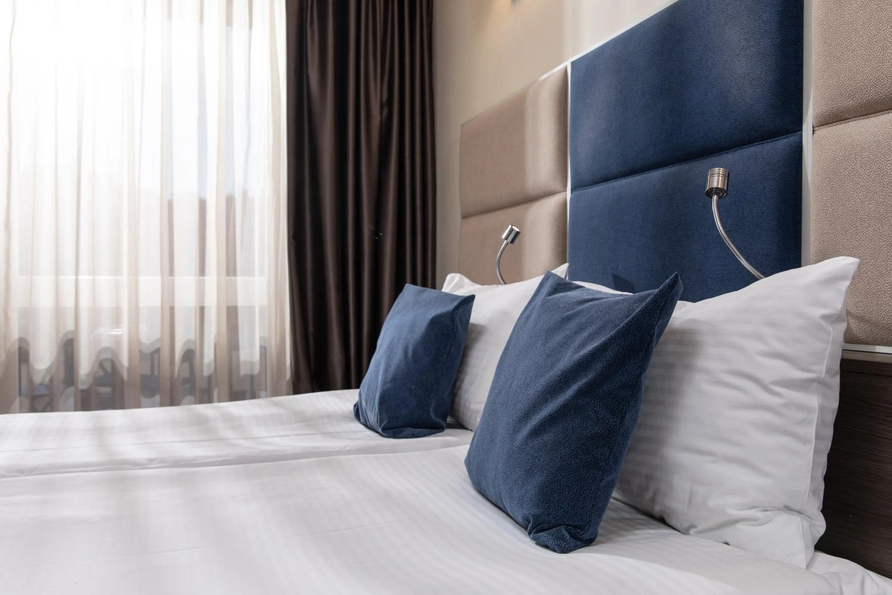 Photo of the whole room, Bed in Belfort Hotel