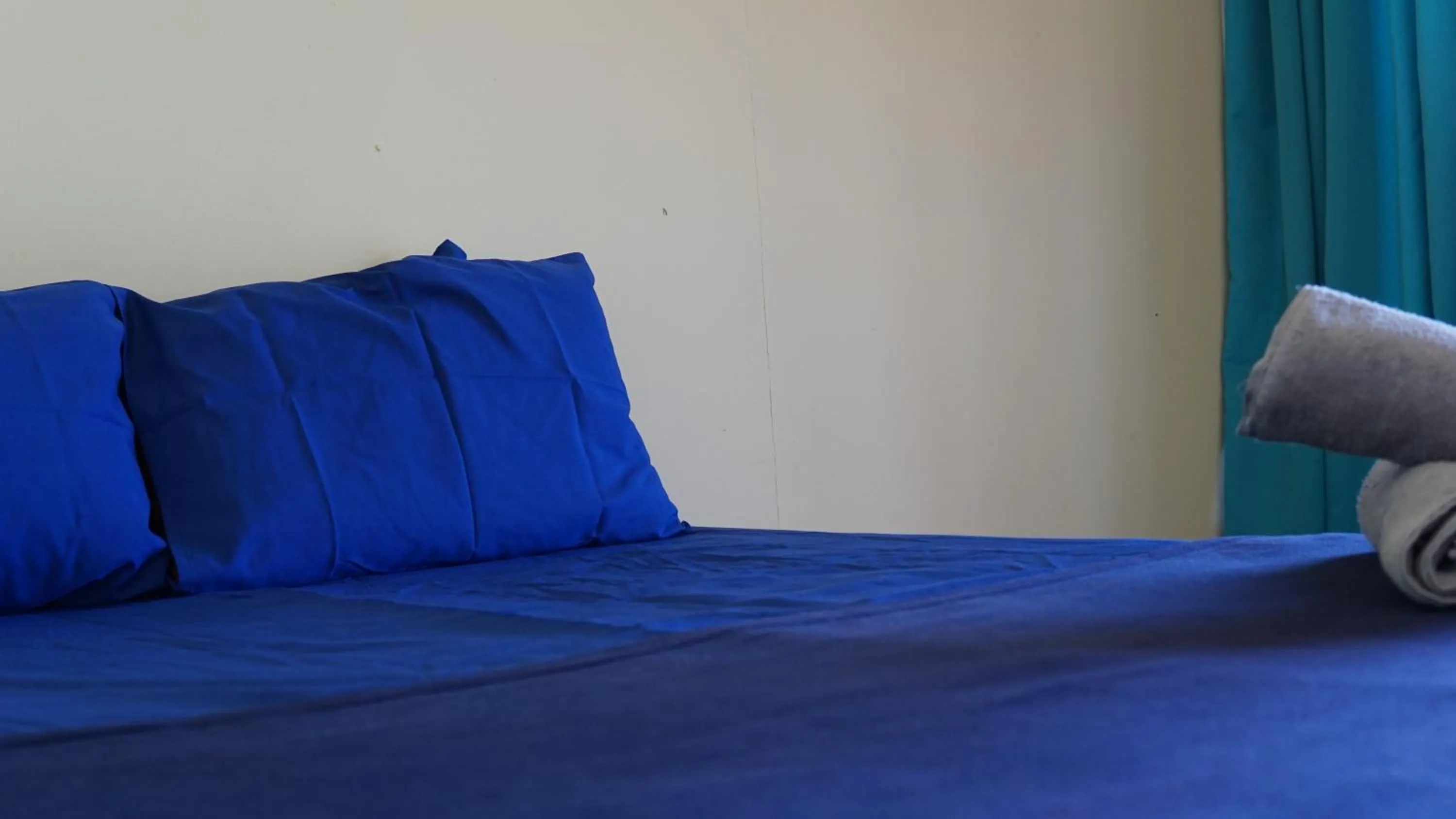 Bed in D Rock Garden Resort