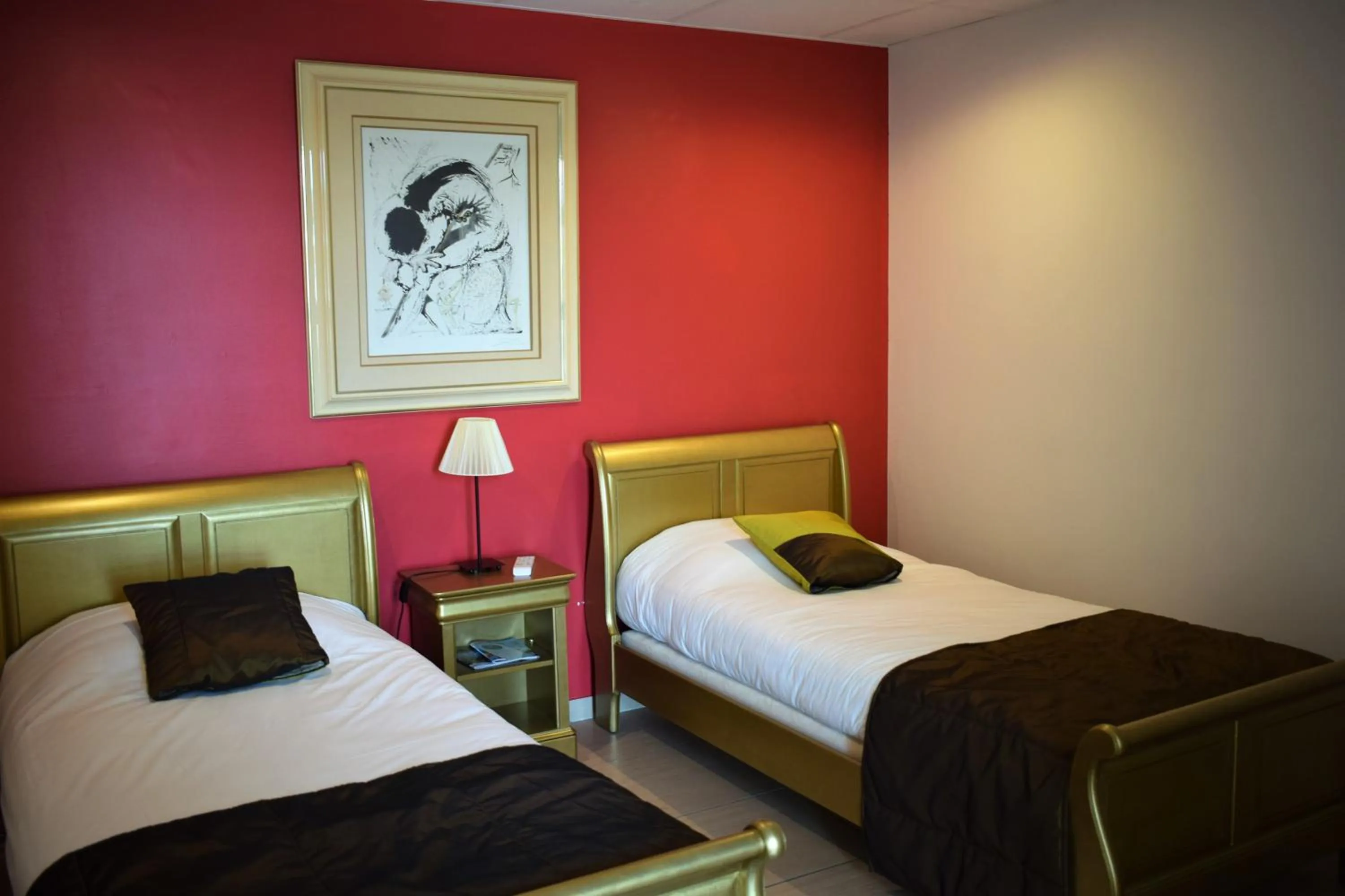 Bed in Logis Hôtel La Fauceille