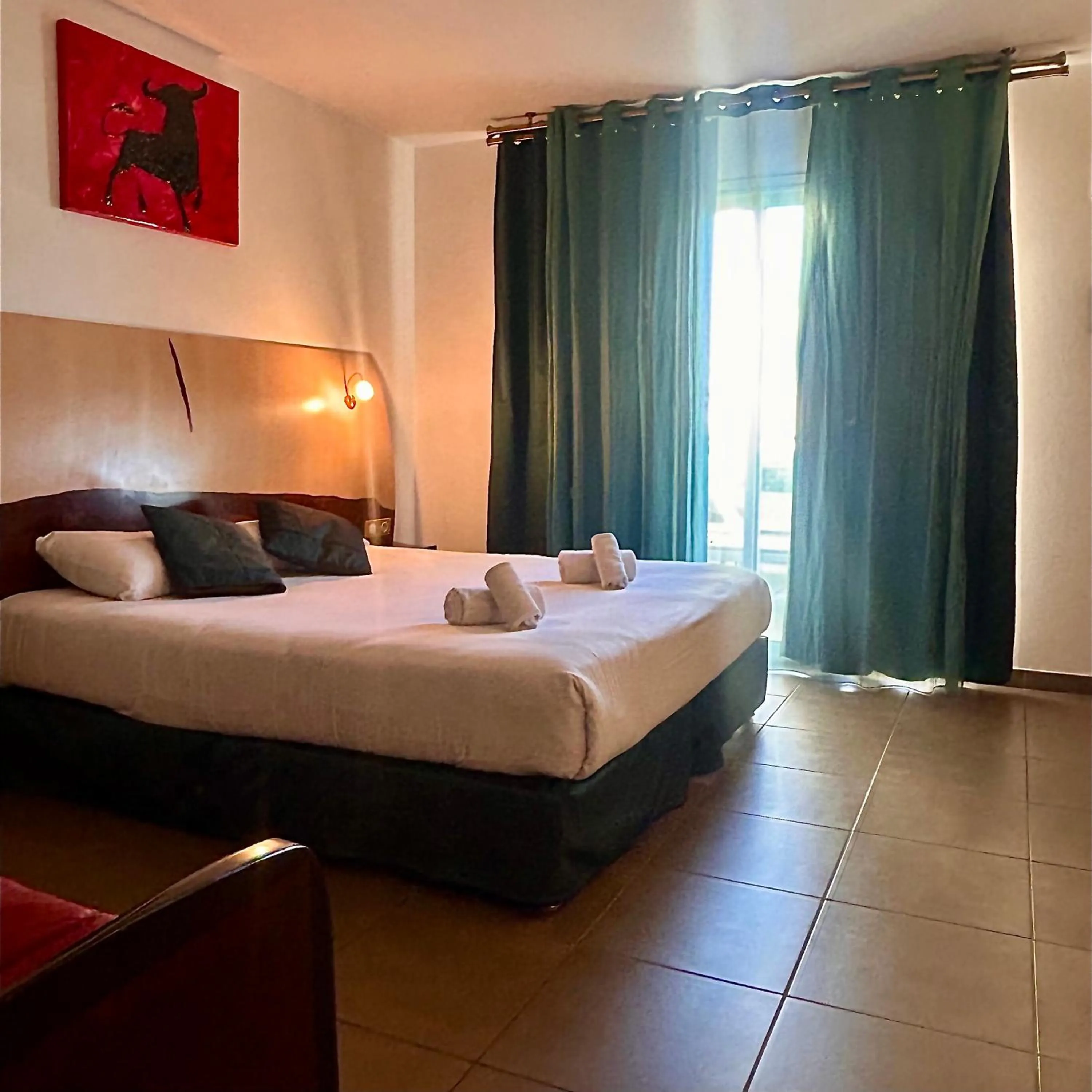 Bed in Logis Hôtel La Fauceille