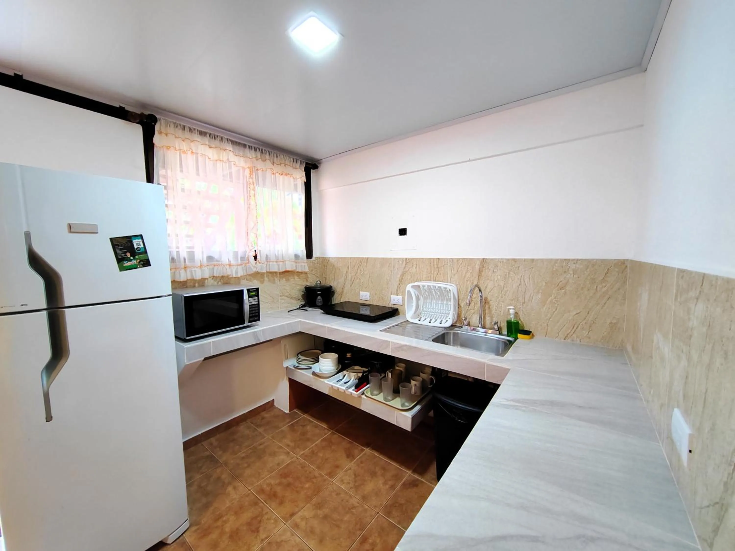 Kitchen or kitchenette in Hotel Los Ranchos