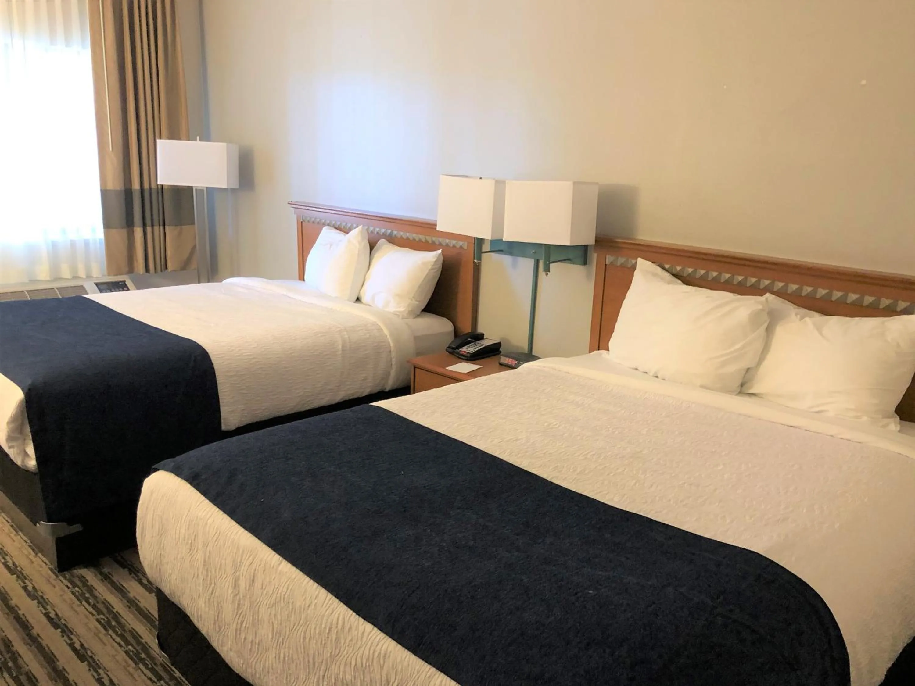 Photo of the whole room, Bed in NavajoLand Inn