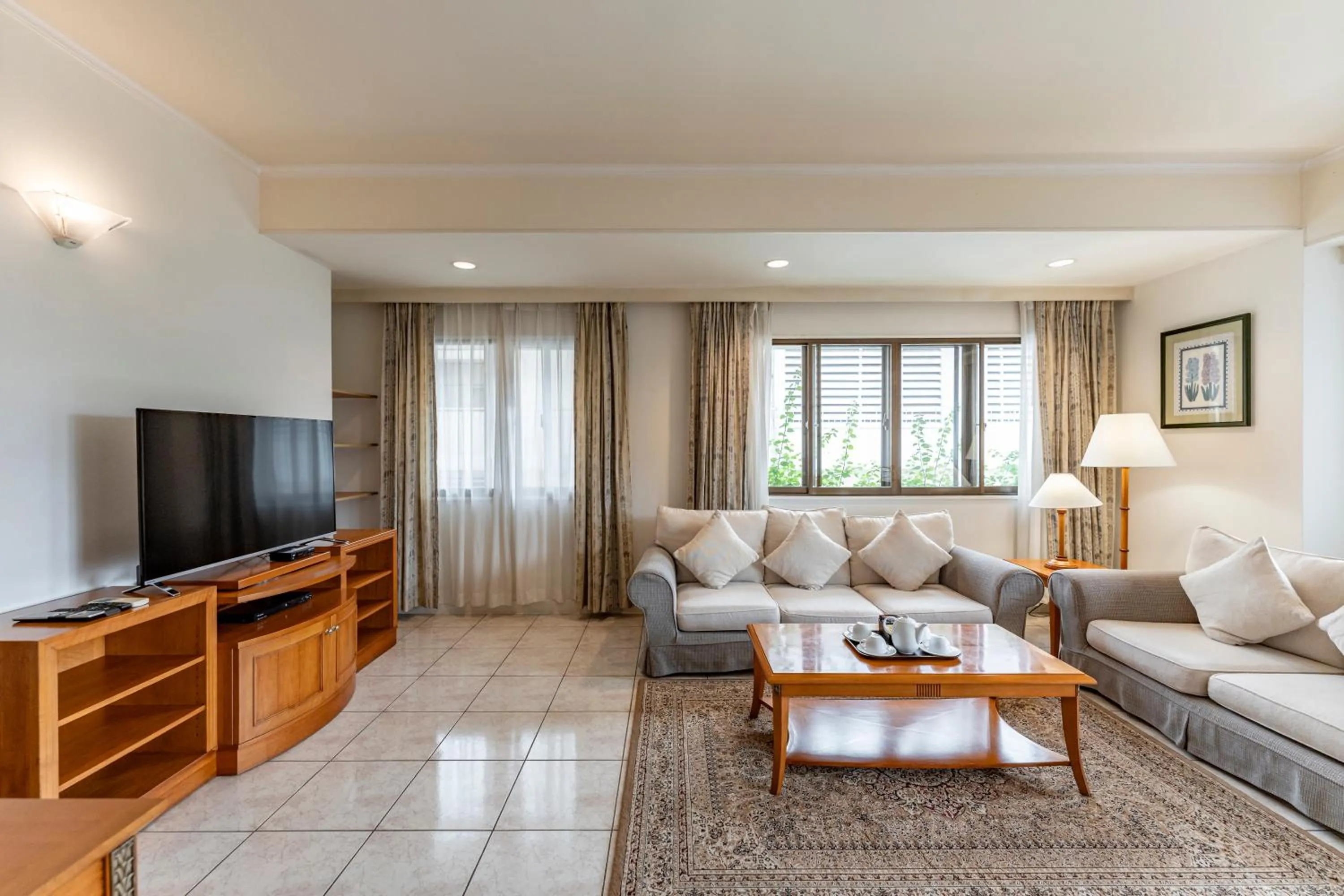 Communal lounge/ TV room in Garden View Court Suites Ho Chi Minh City