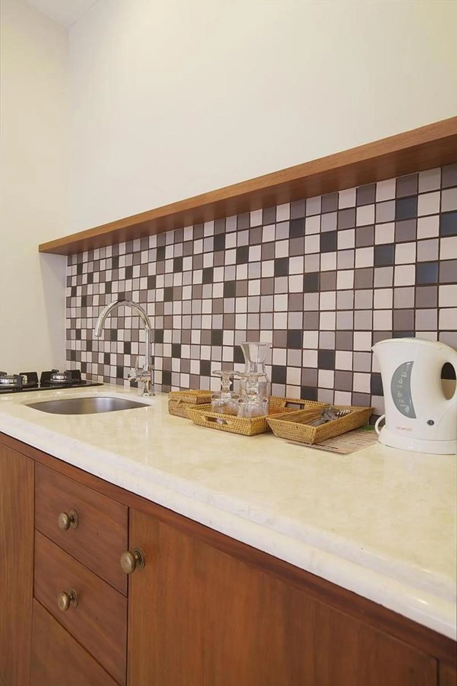 Kitchen or kitchenette in Seminyak Lagoon All Suites Hotel