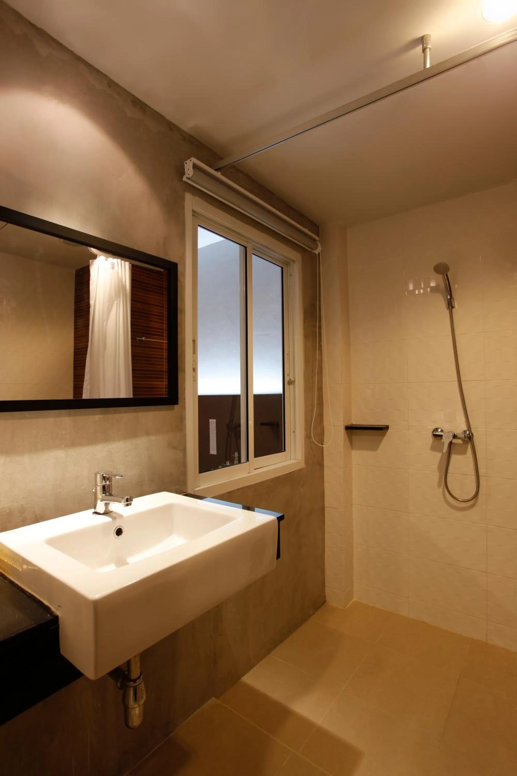 Bathroom in Nize Hotel (SHA Plus)