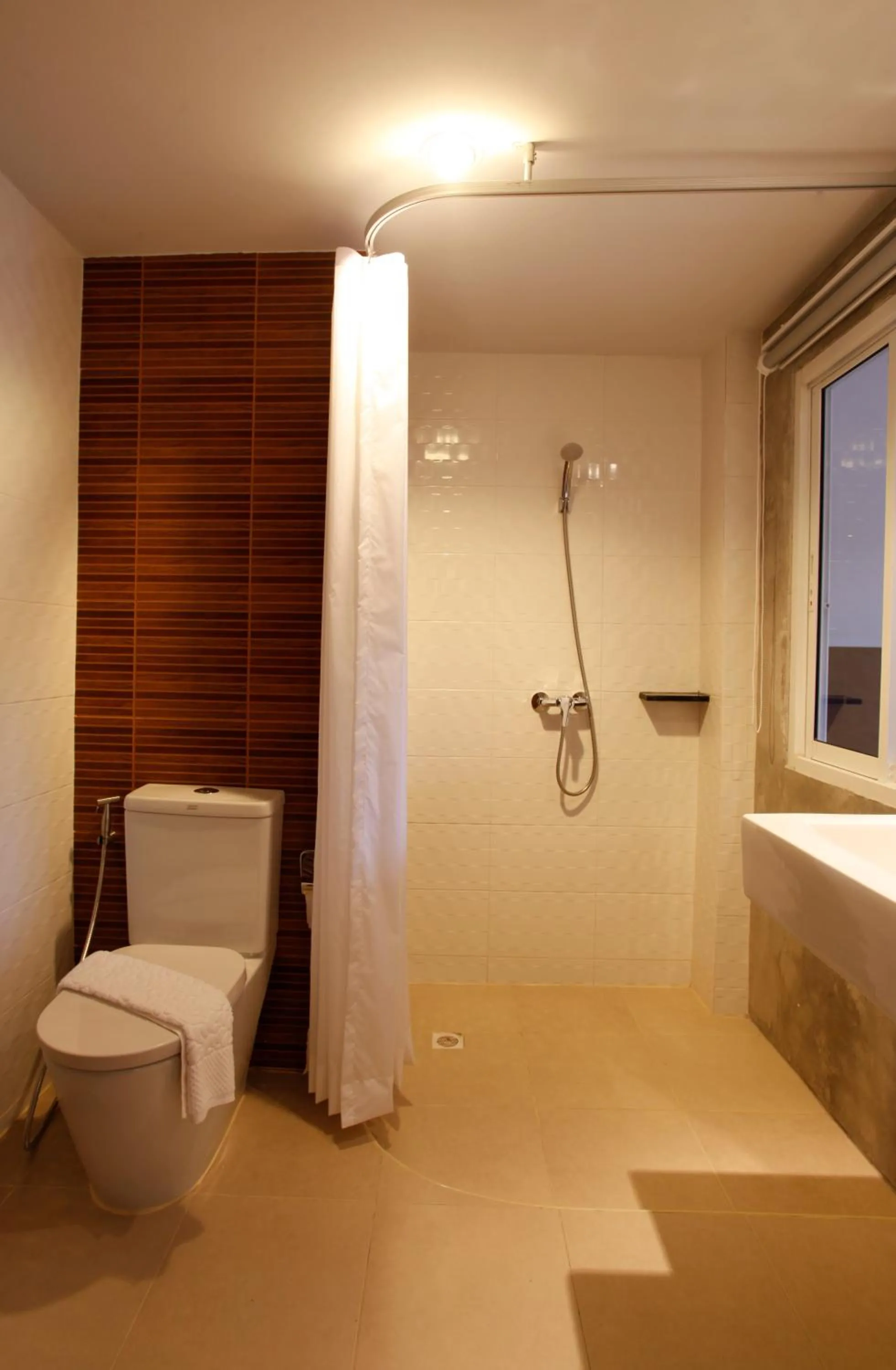 Bathroom in Nize Hotel (SHA Plus)