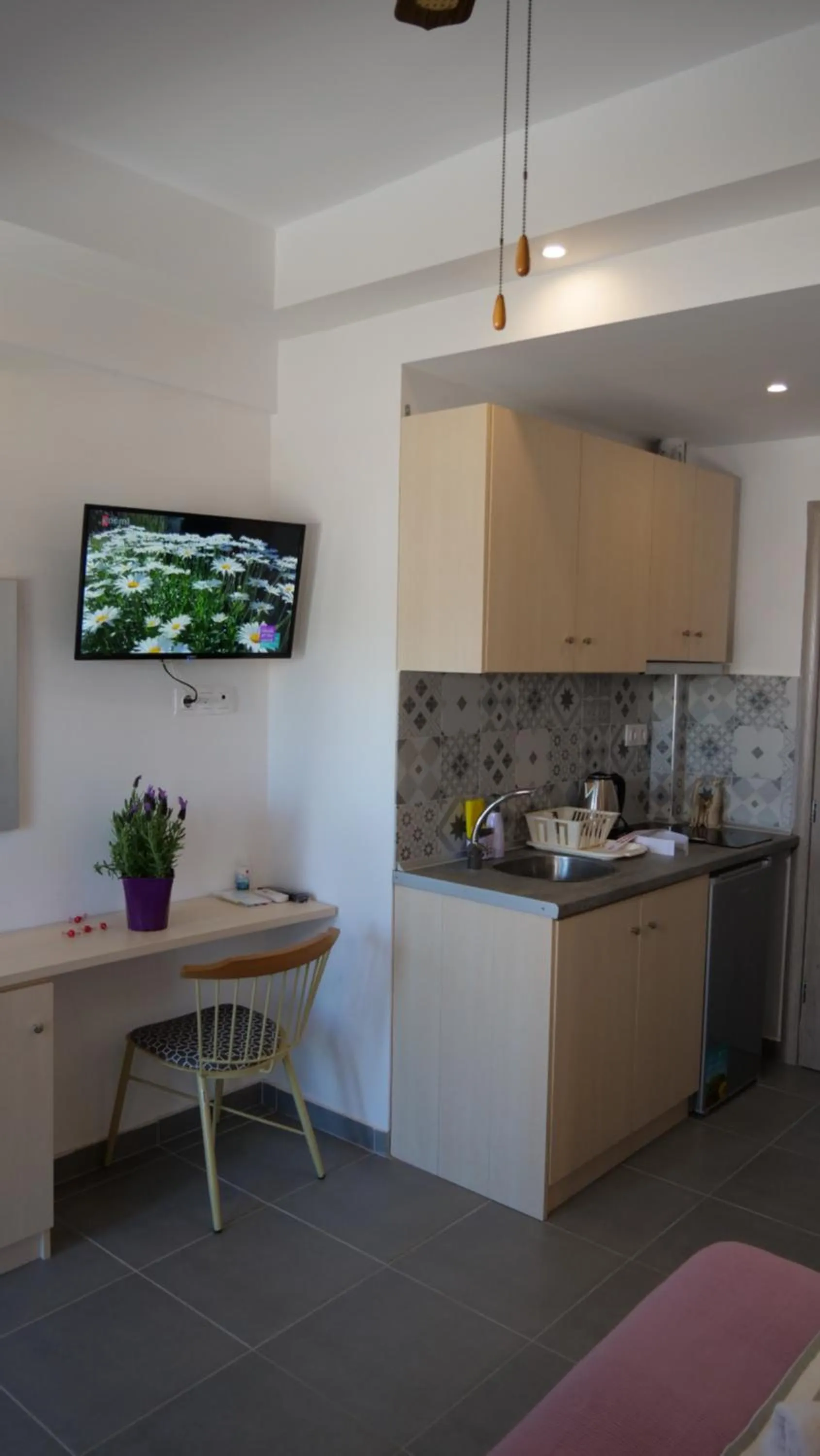 Kitchen or kitchenette in Ammos Hotel