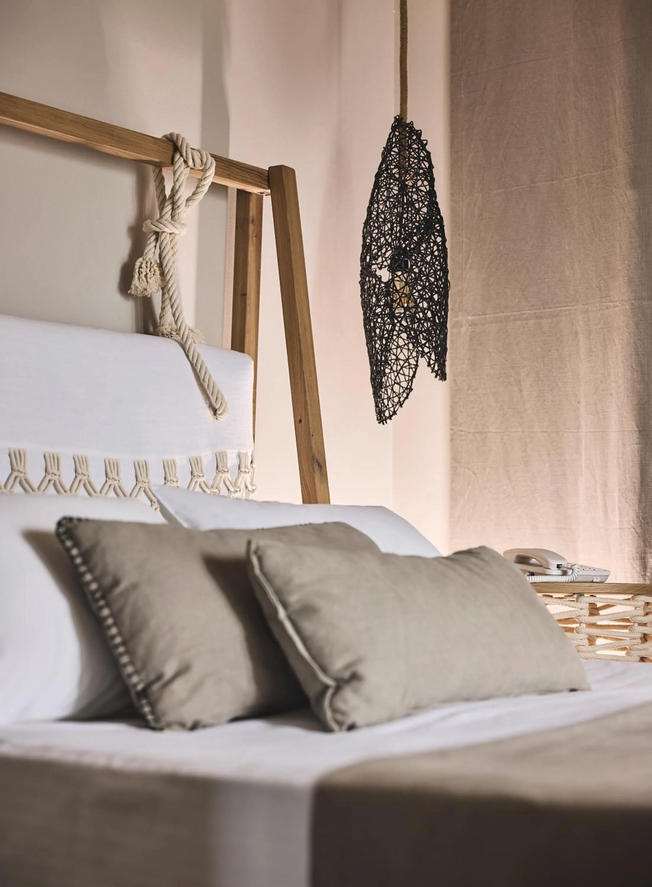 Bed in Xenia Residence & Suites