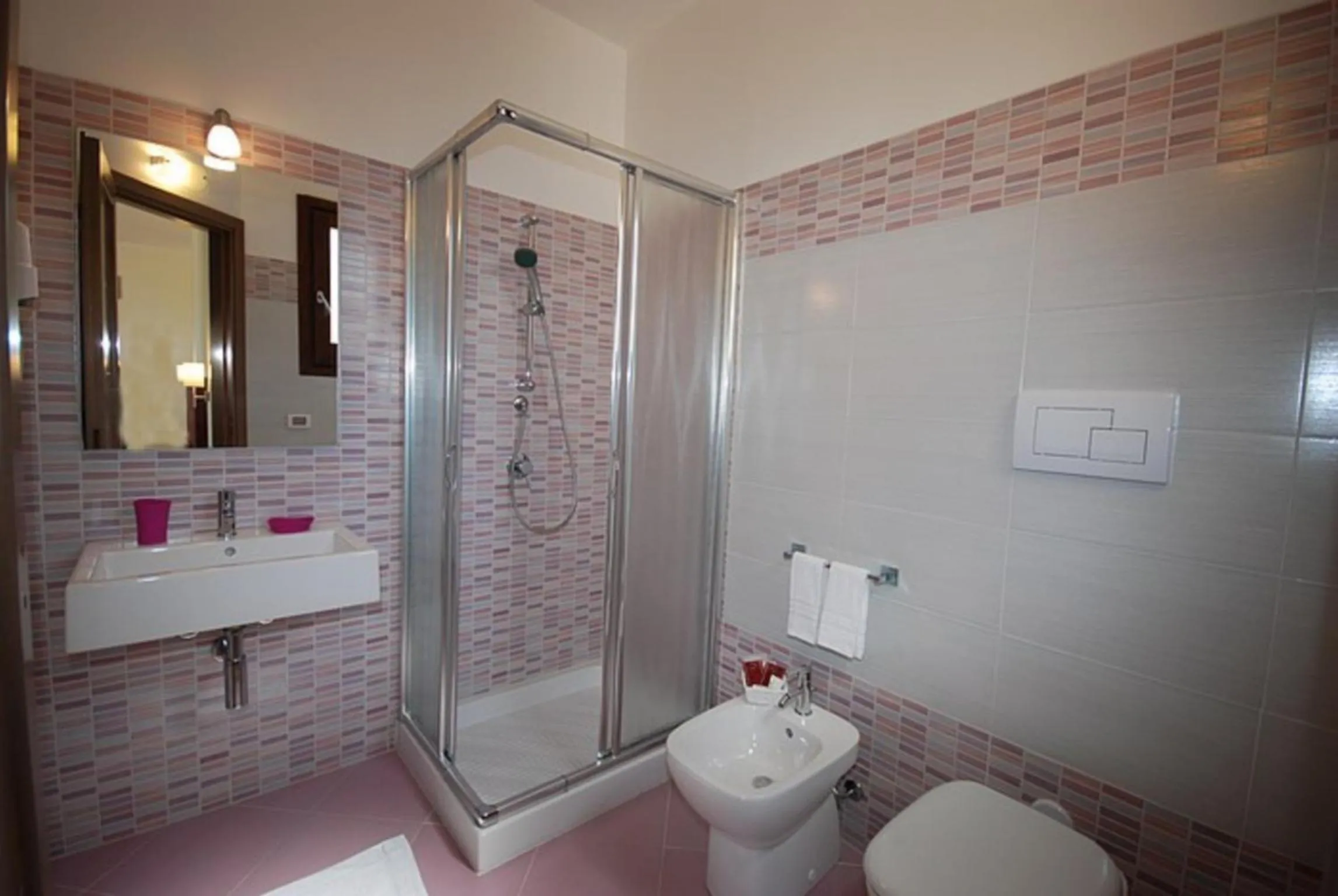 Bathroom in Trigrana Vacanze Hotel