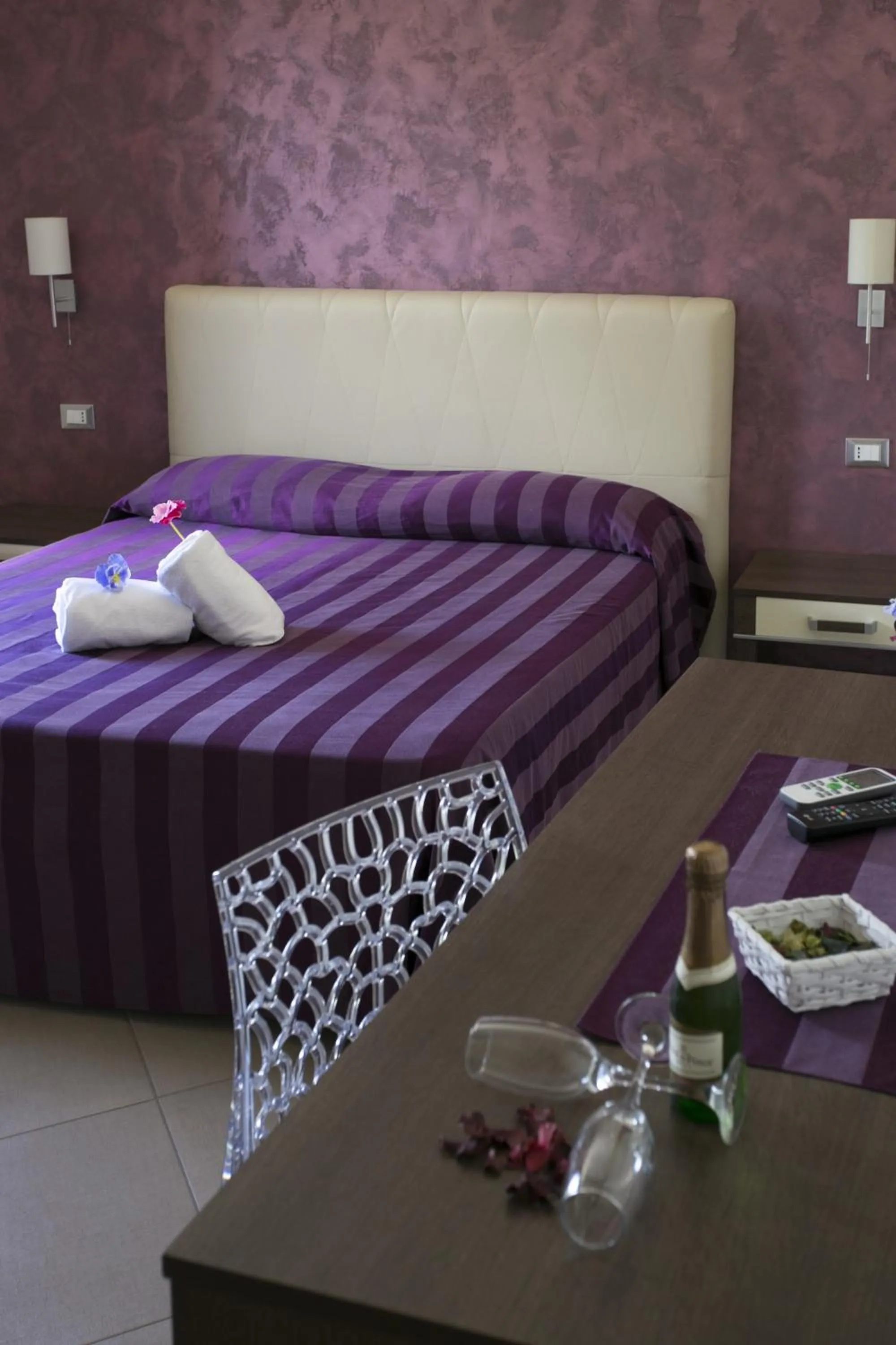 Bed in Trigrana Vacanze Hotel