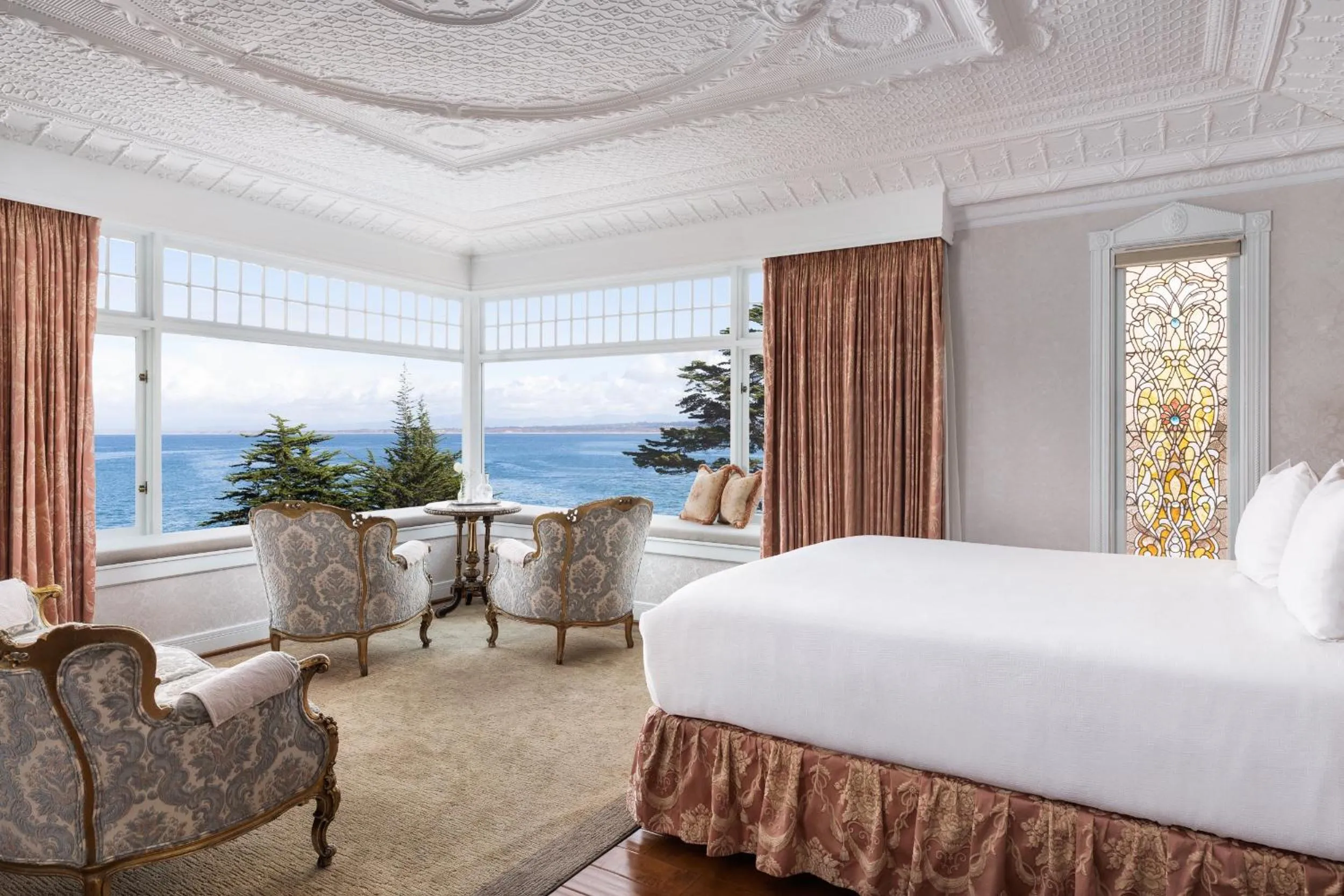 Seating area, Bed in Seven Gables Inn on Monterey Bay, A Kirkwood Collection Hotel