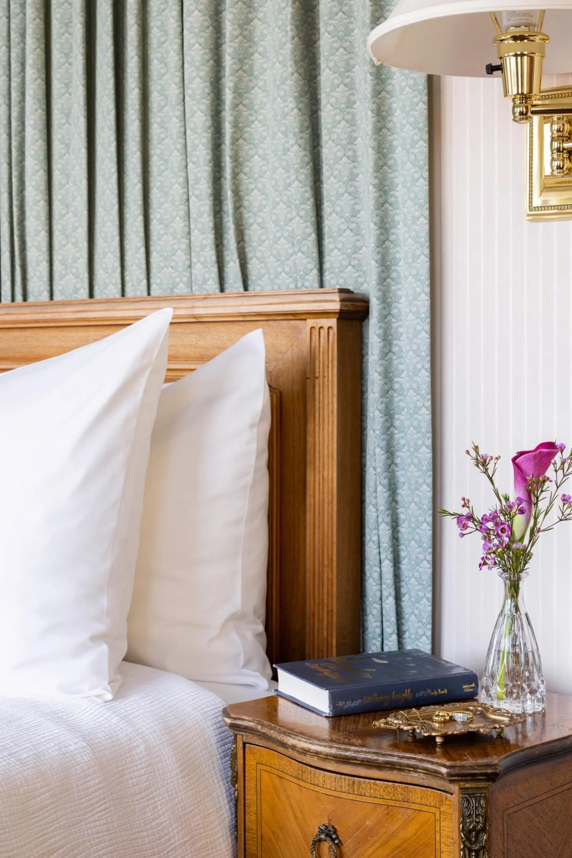 Decorative detail, Bed in Seven Gables Inn on Monterey Bay, A Kirkwood Collection Hotel
