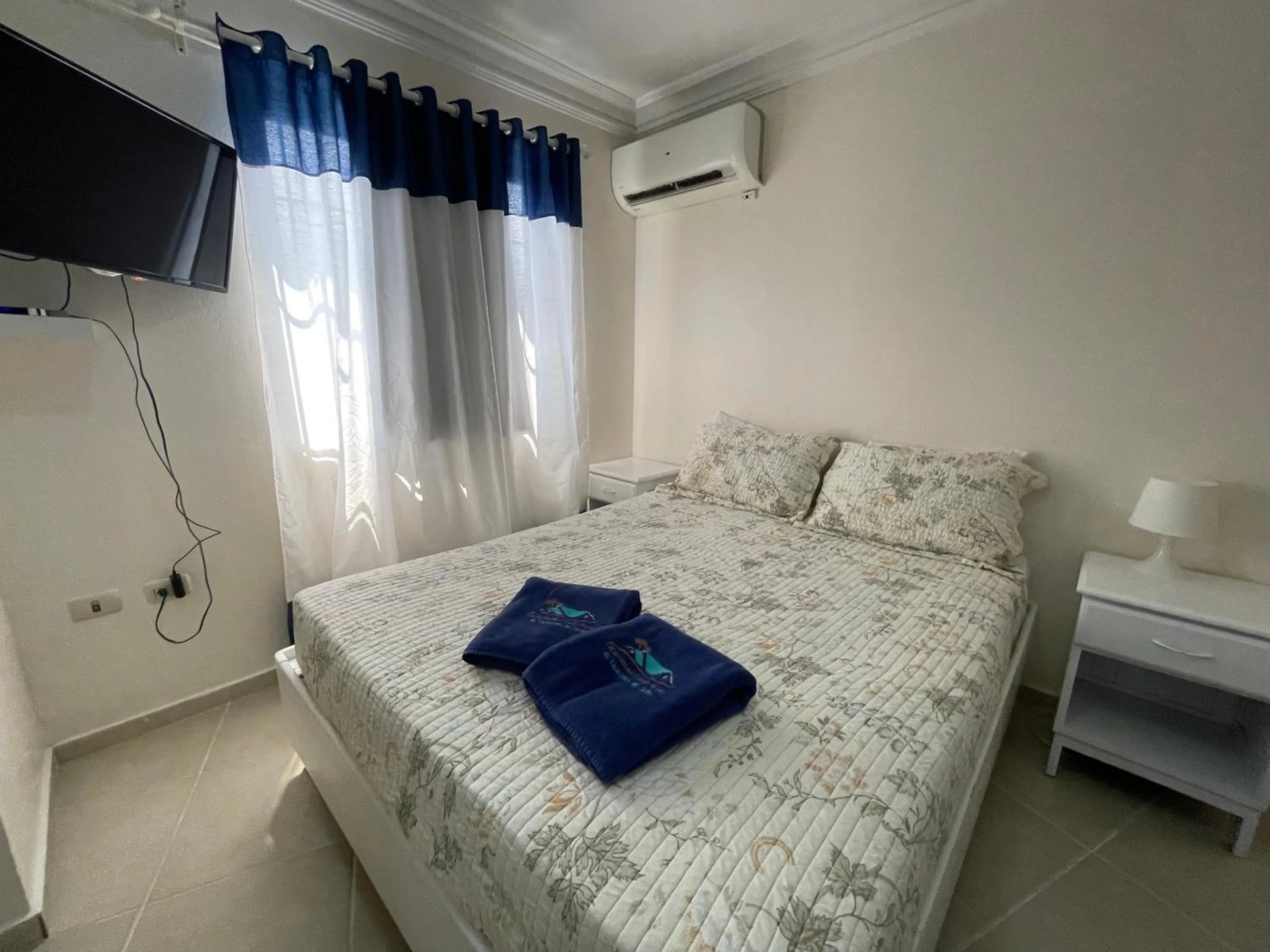 Photo of the whole room, Bed in Karimar Beach Condo Hotel