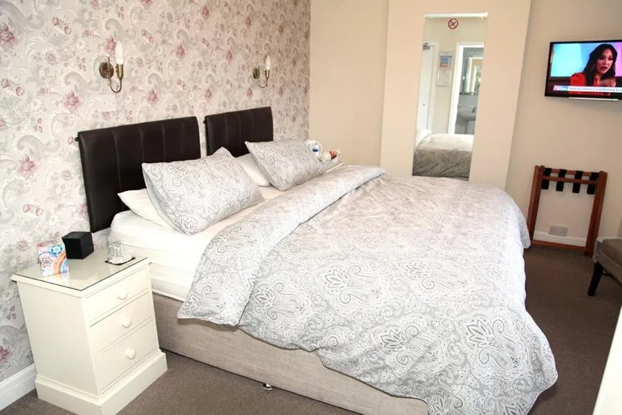 Bed in The Hinton Guest House