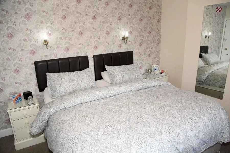 Bed in The Hinton Guest House