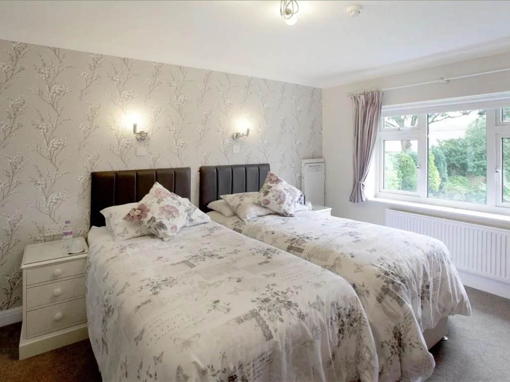 Bed in The Hinton Guest House