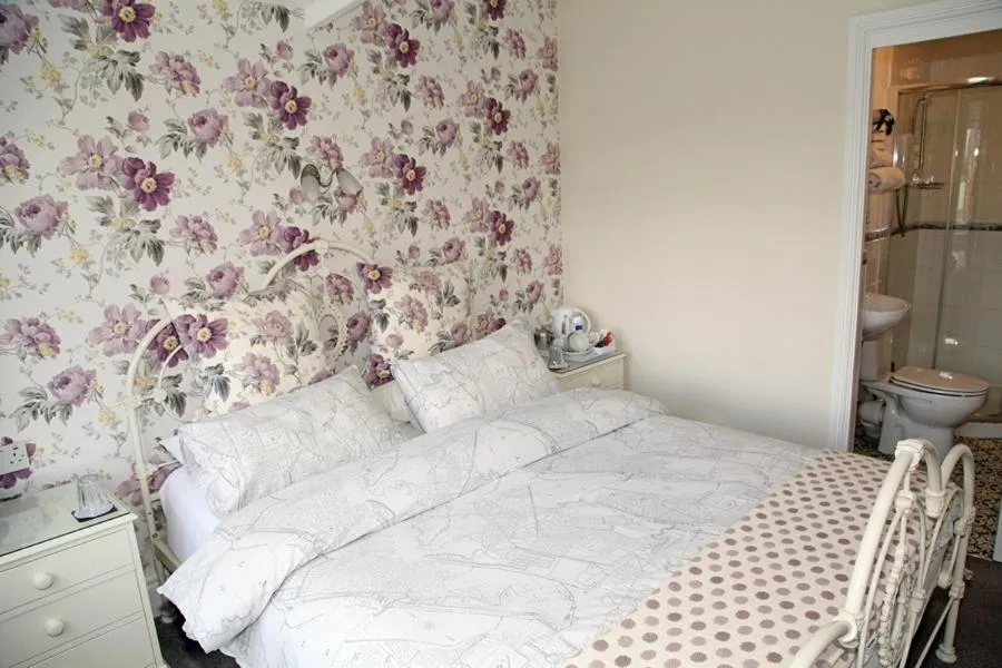 Bed in The Hinton Guest House