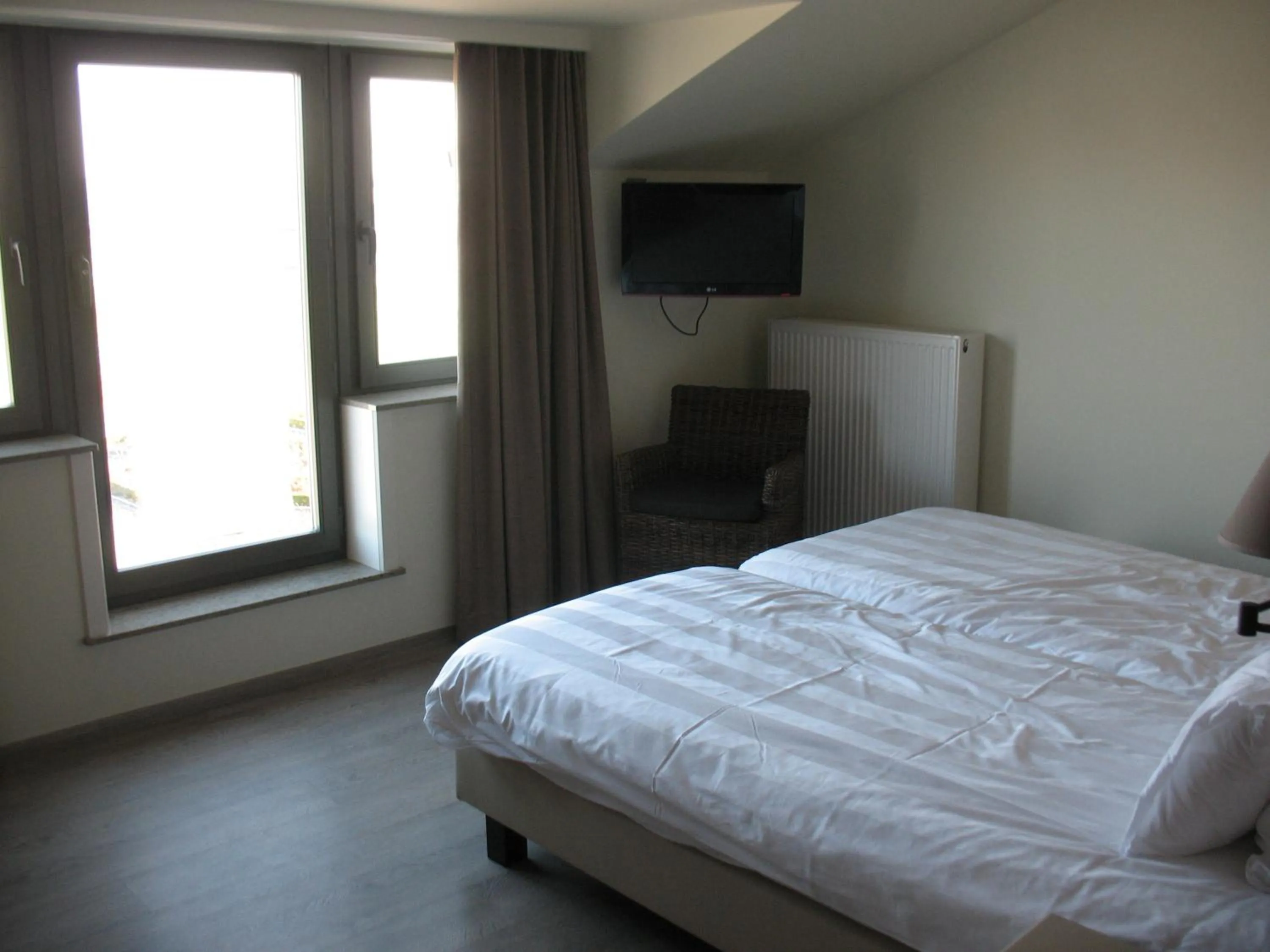 Bed in B&B La Vie En Roses