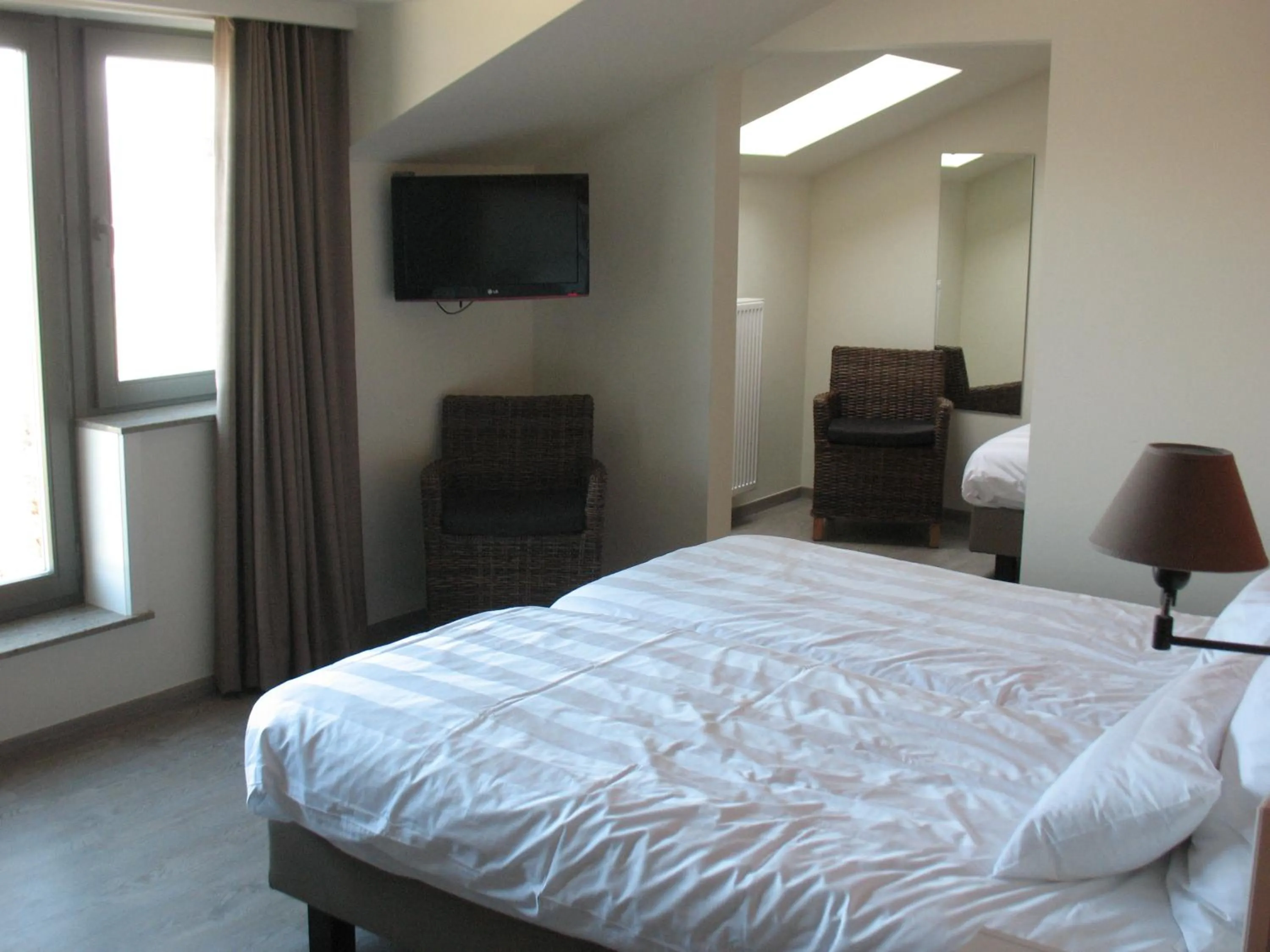 Bed in B&B La Vie En Roses