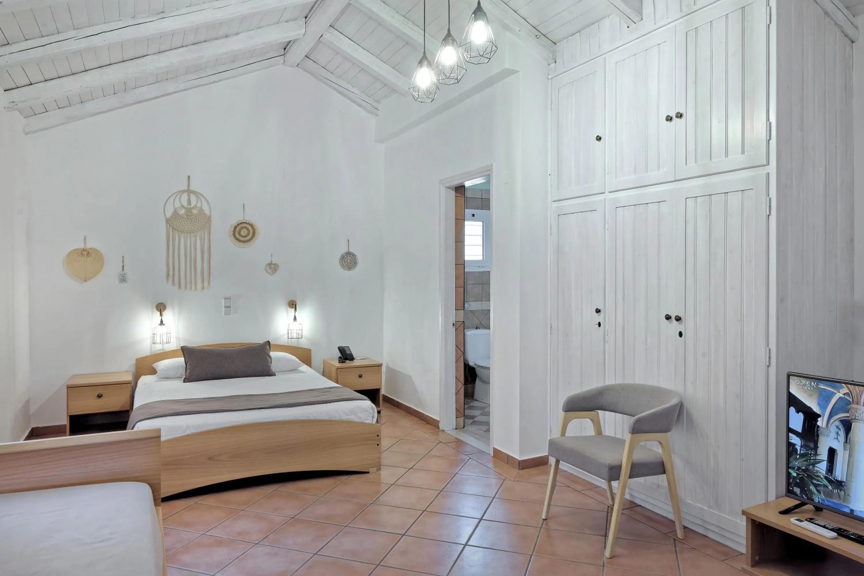 Bed in The Grove Seaside Hotel