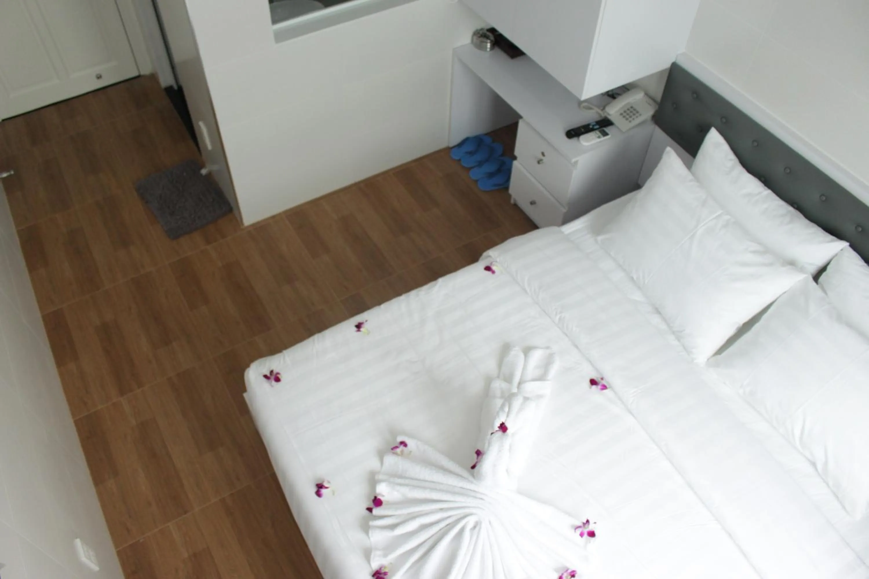 Bed in DRAGON HOTEL 1