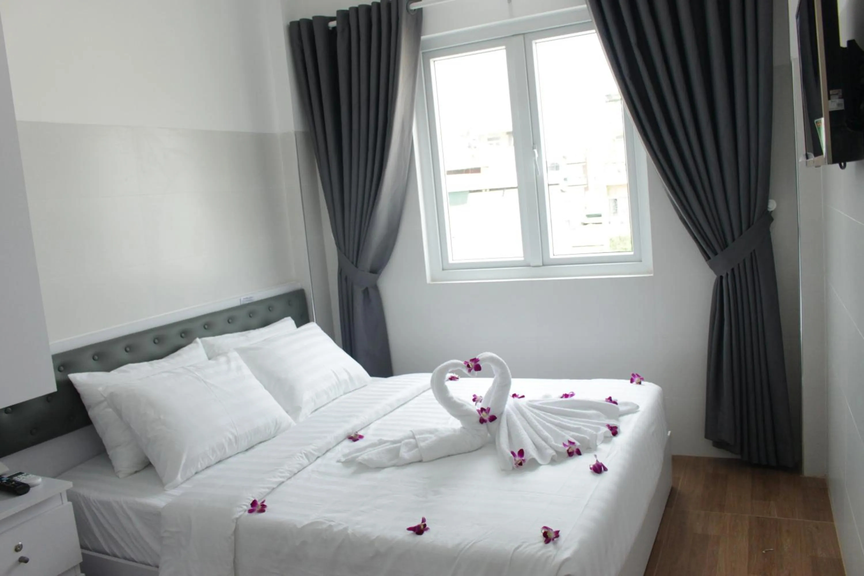 Bed in DRAGON HOTEL 1