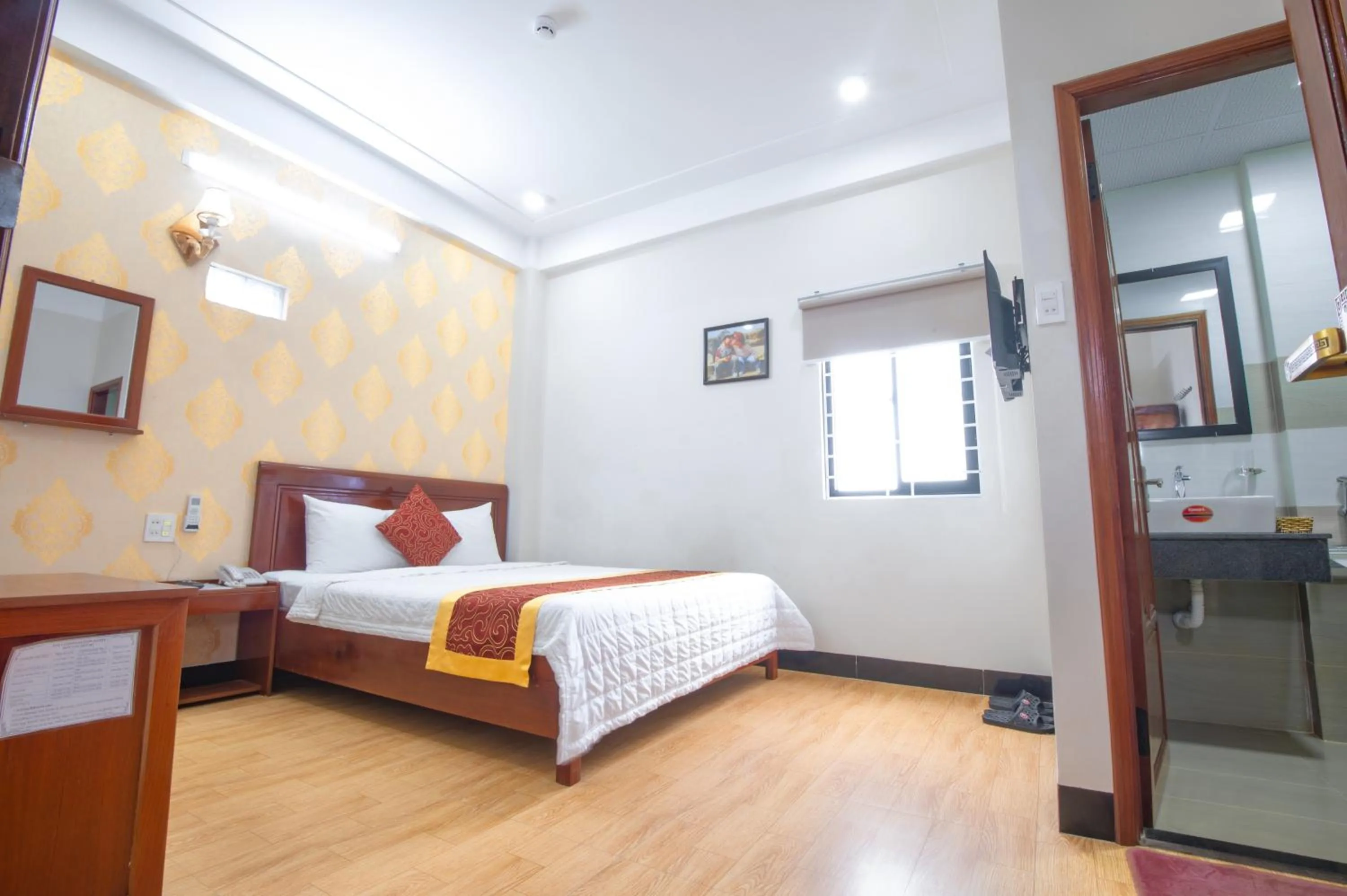 Bed in NEW DAY HOTEL