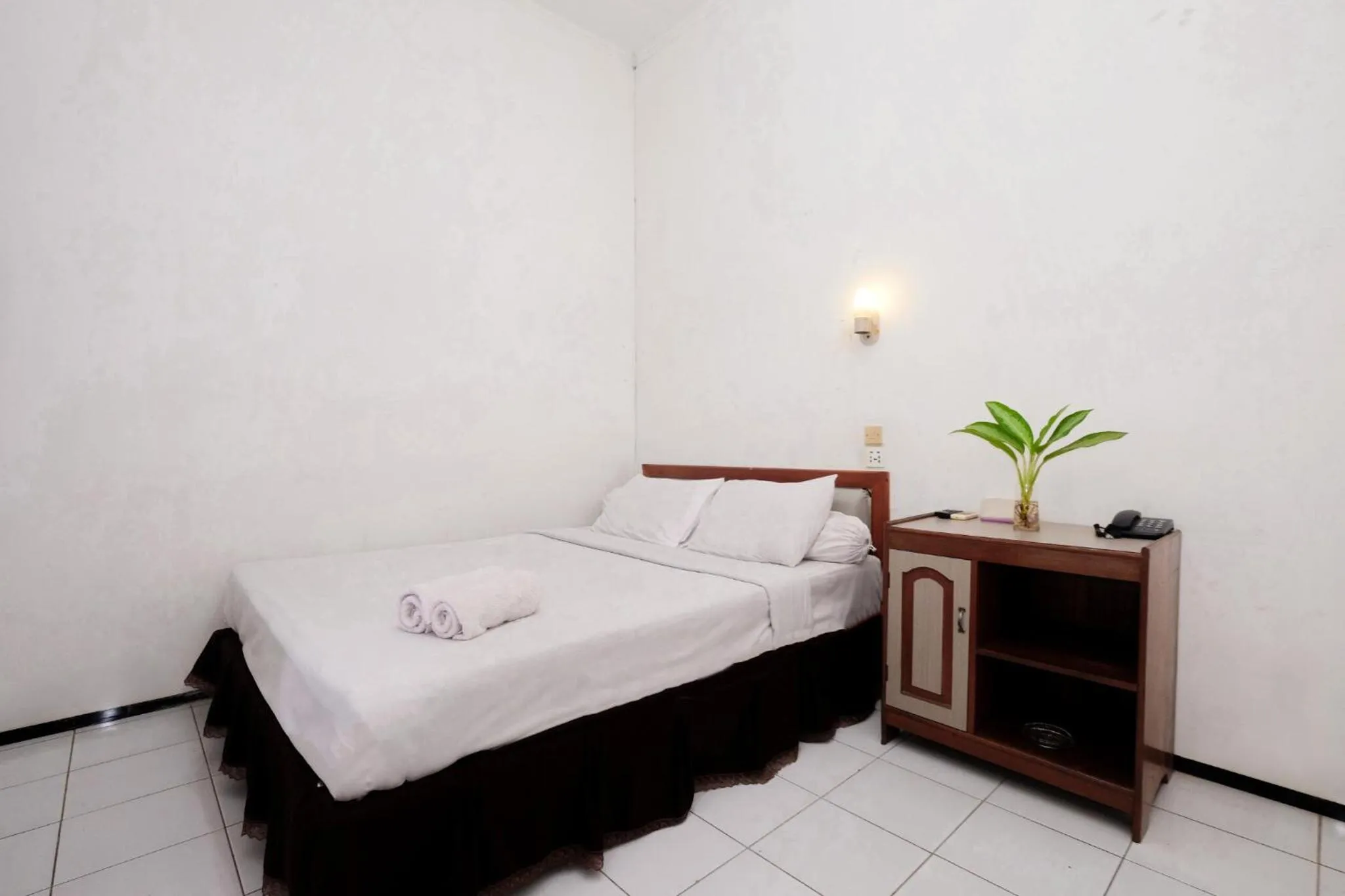 Bed in Berlian Abadi Hotel by Sinergi