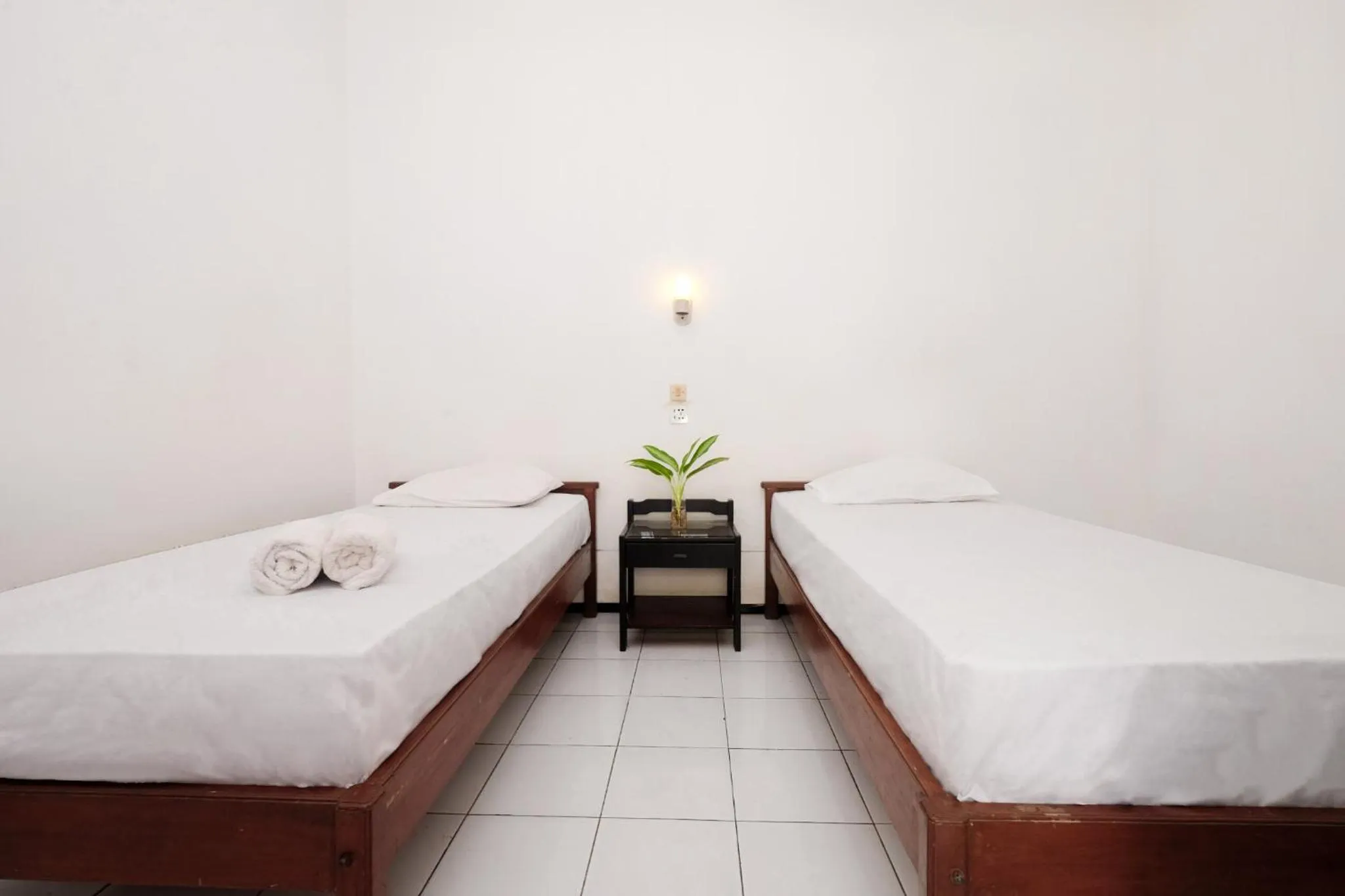 Bed in Berlian Abadi Hotel by Sinergi