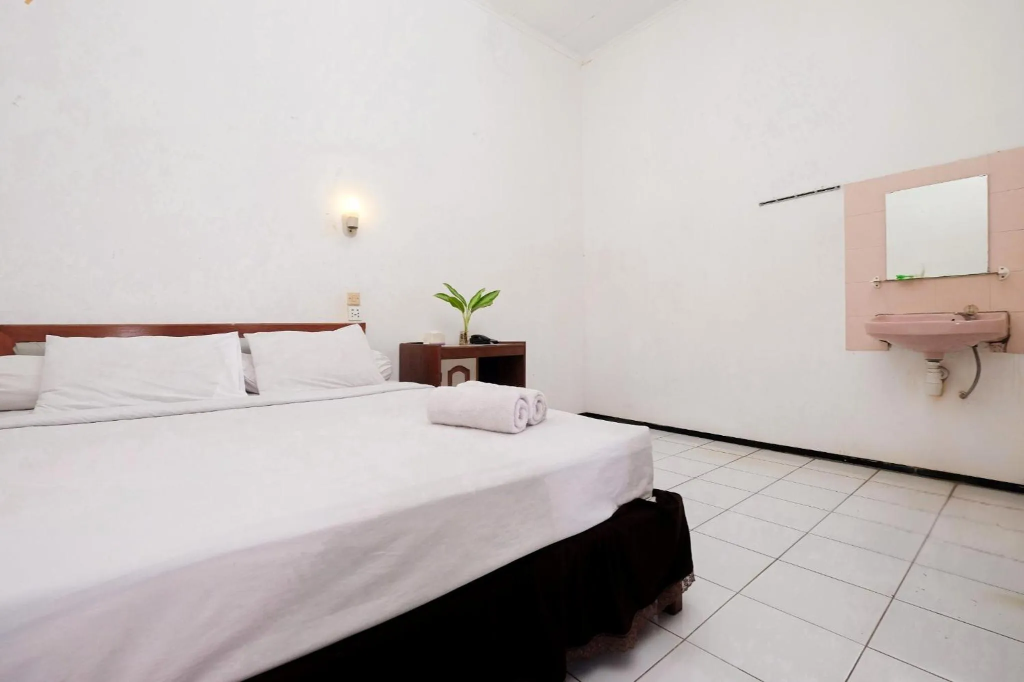 Bed in Berlian Abadi Hotel by Sinergi