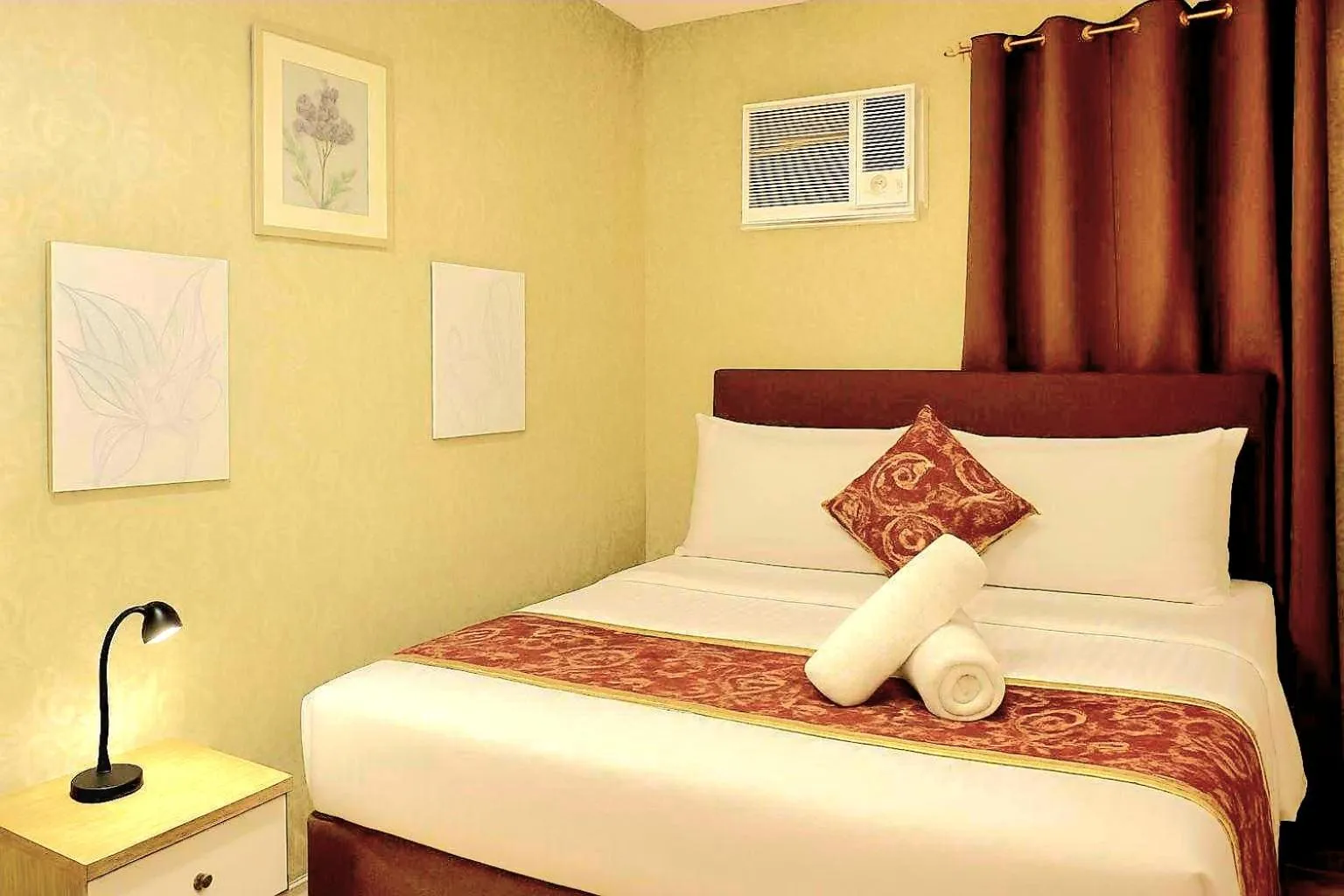 Bed in JMM Grand Suites