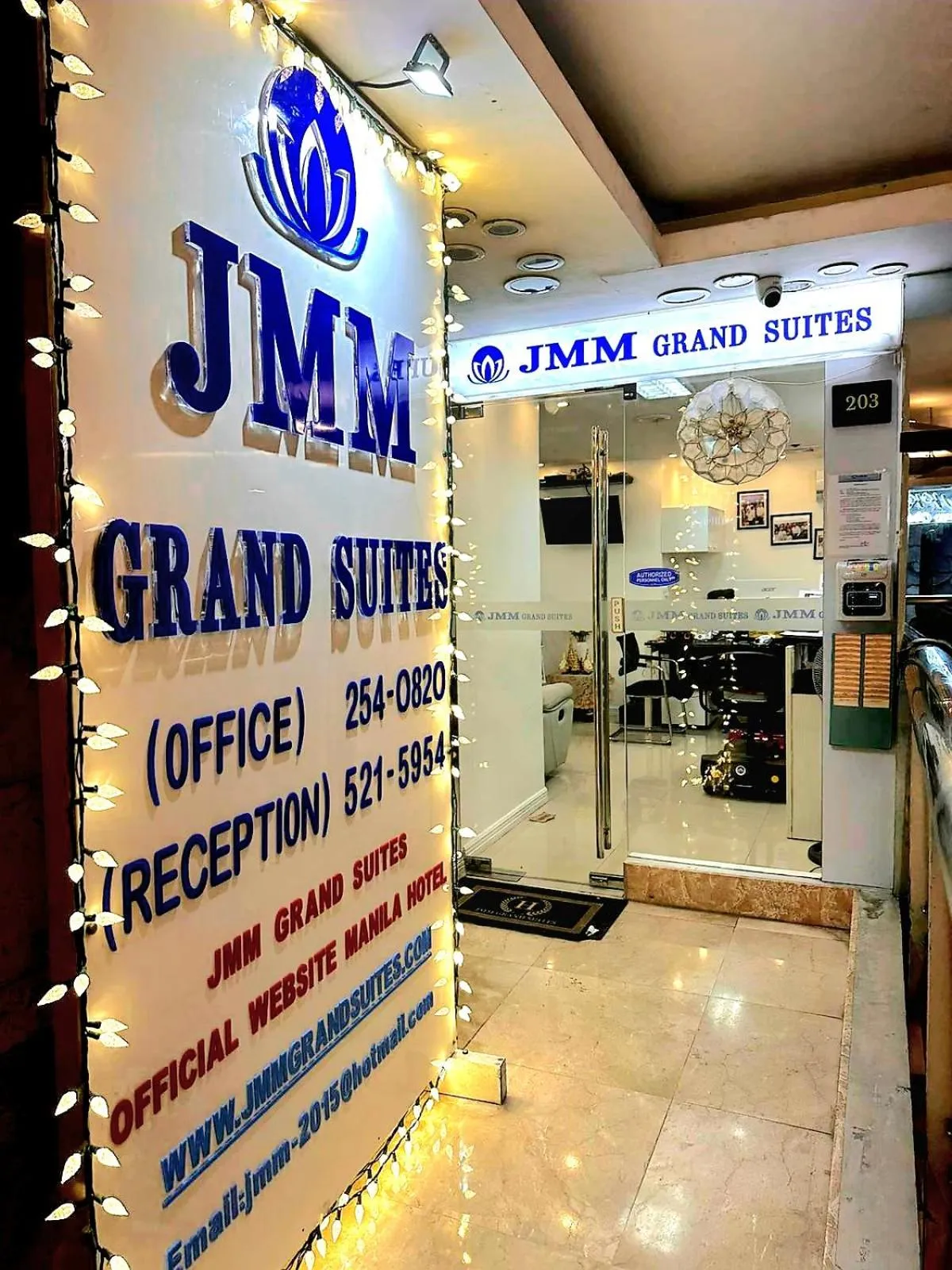 Property logo or sign in JMM Grand Suites