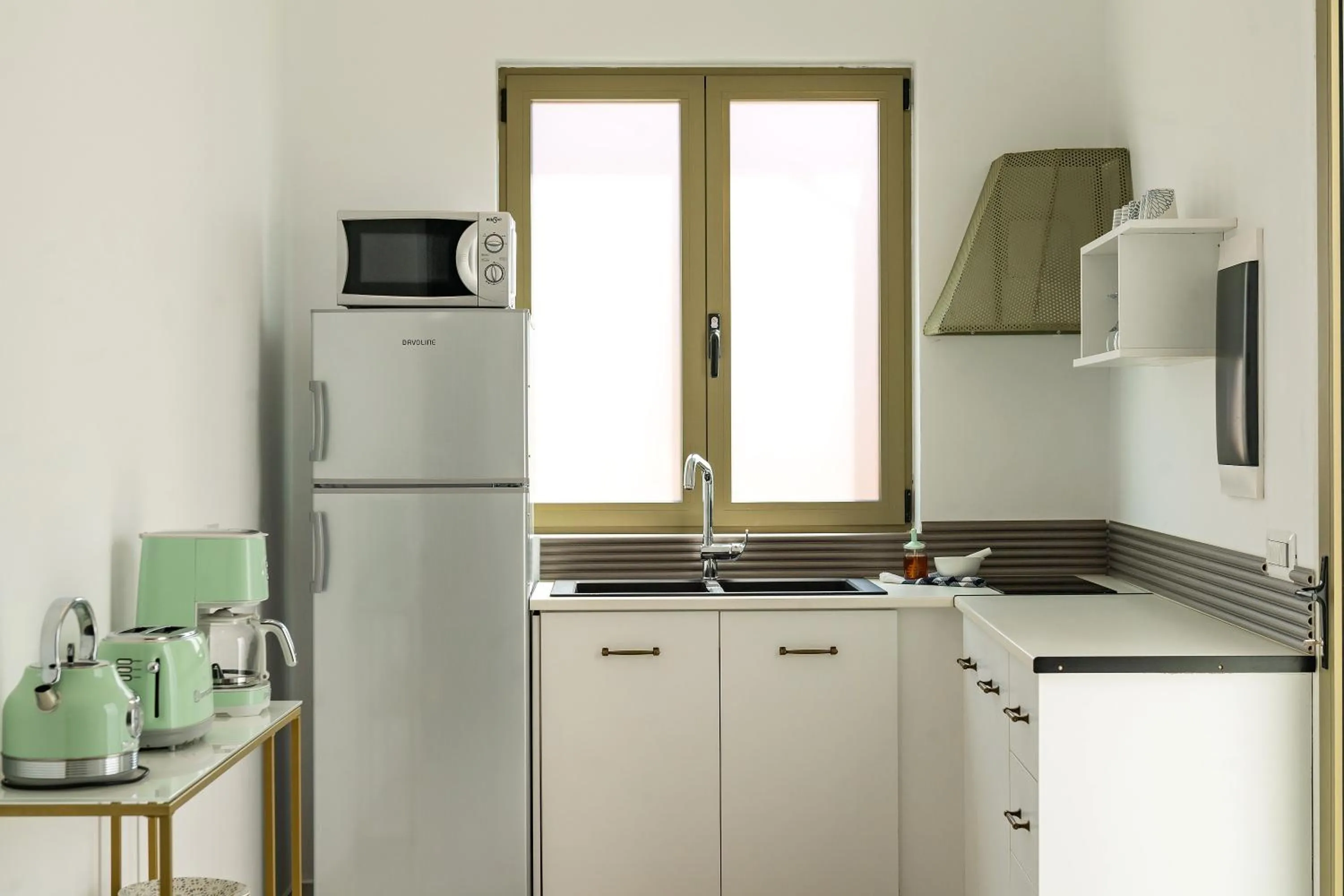 Kitchen or kitchenette in Lefka Hotel & Apartments