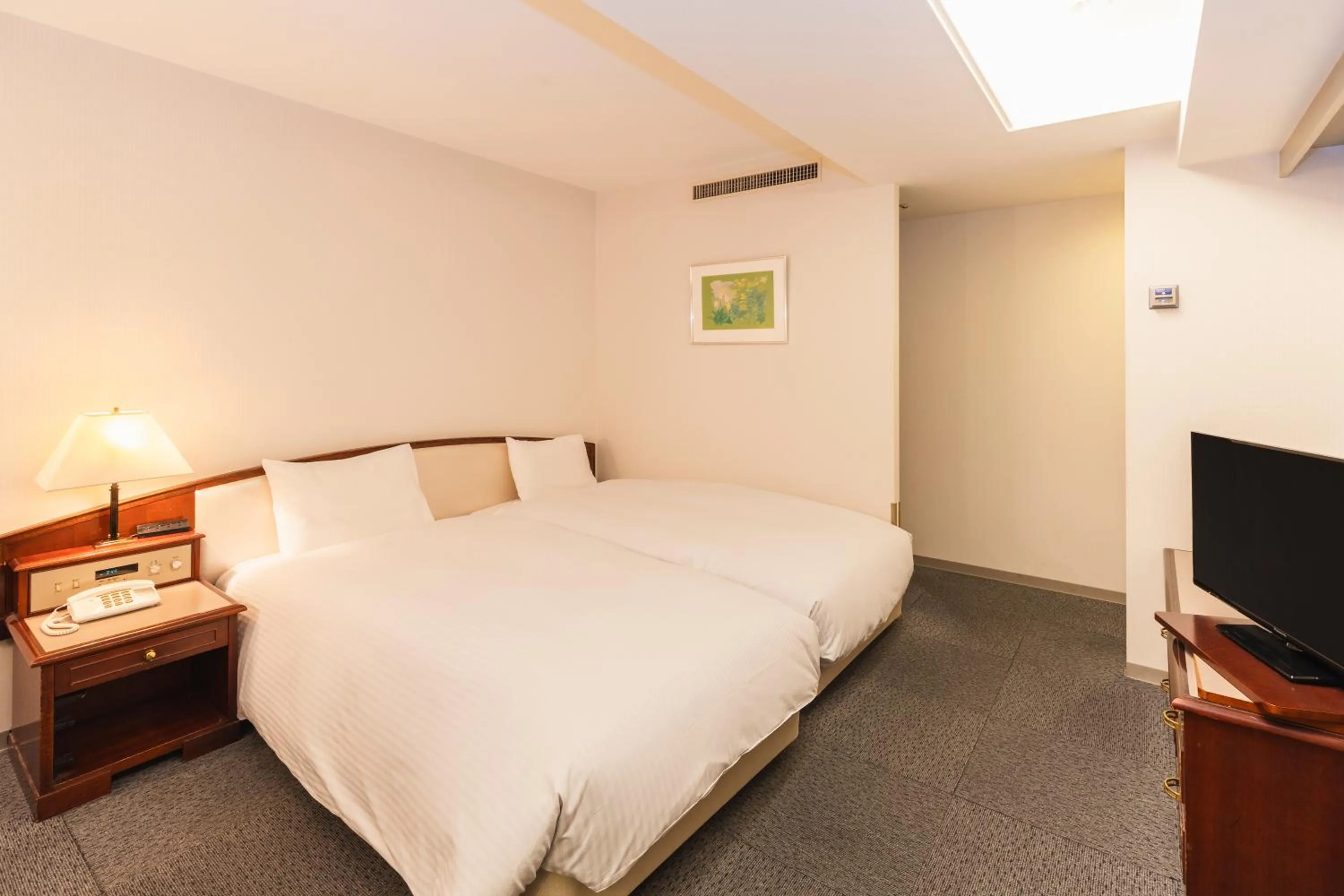Photo of the whole room, Bed in Hotel Sunroute Niigata
