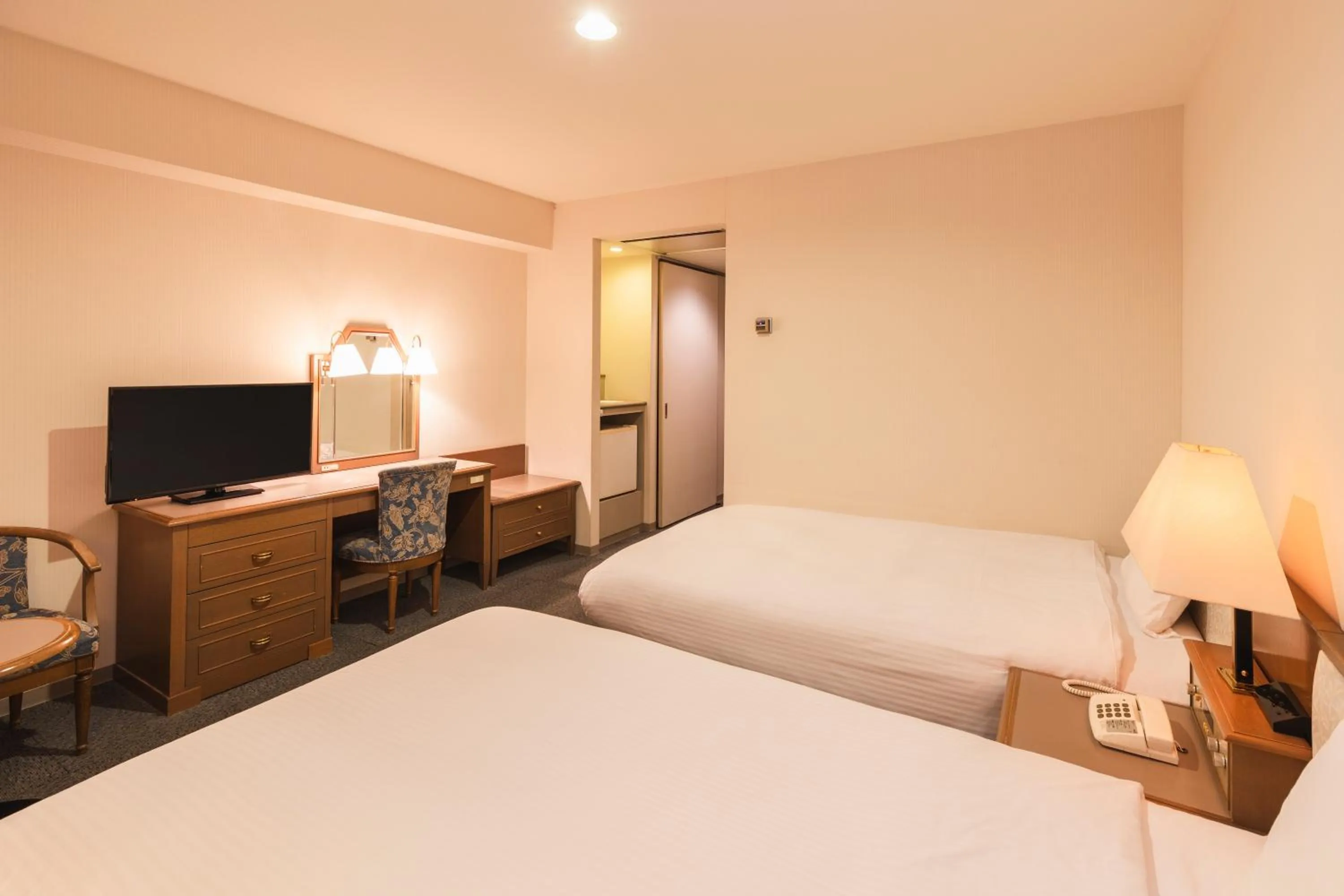 Photo of the whole room, Bed in Hotel Sunroute Niigata