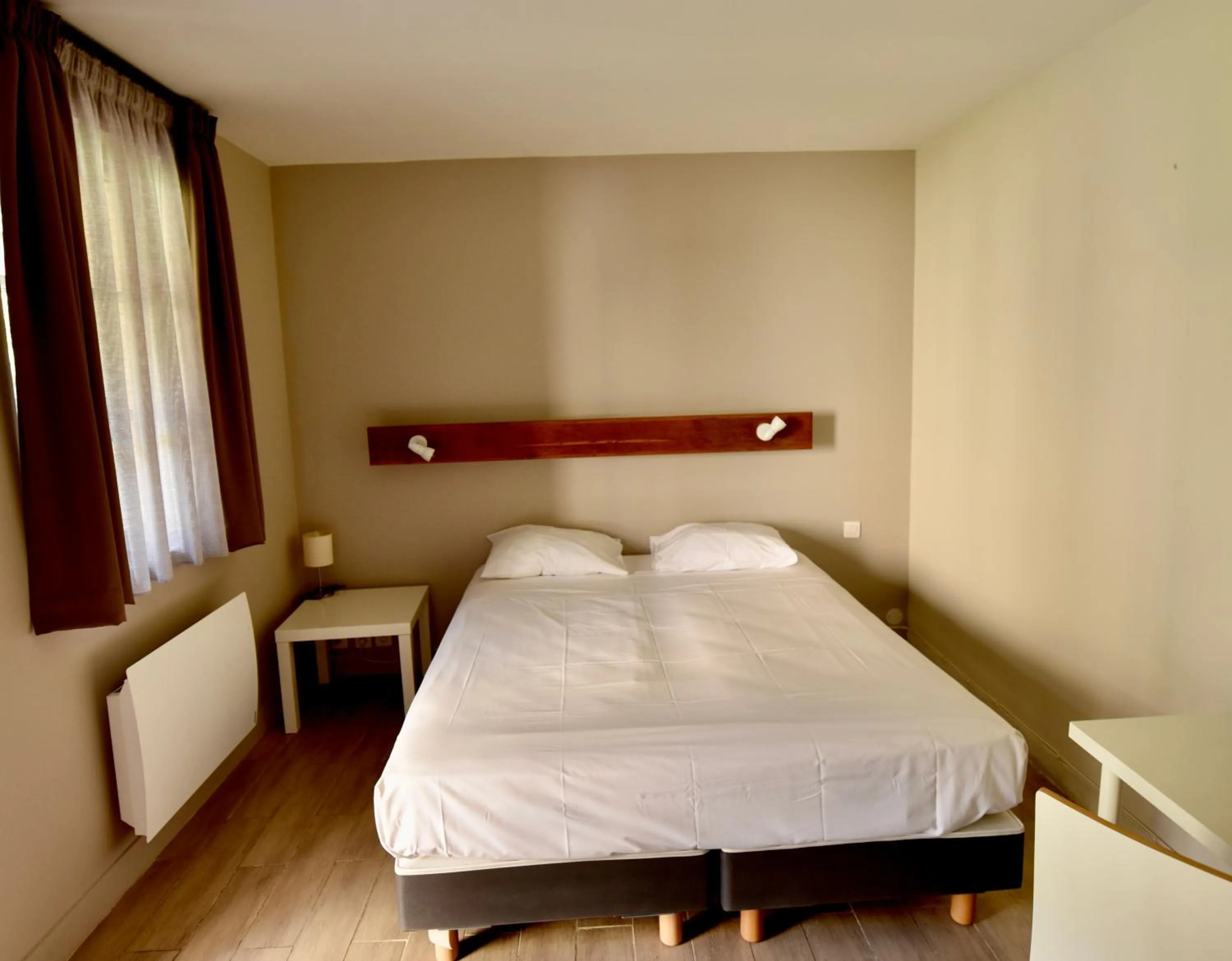 Bed in Le Relais du Château