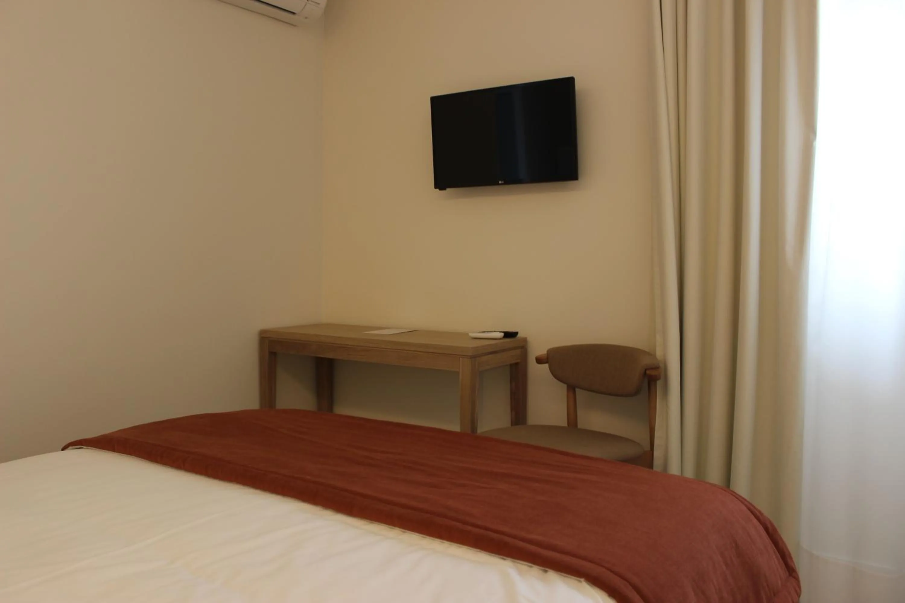 Bed in Fátima GuestHouse