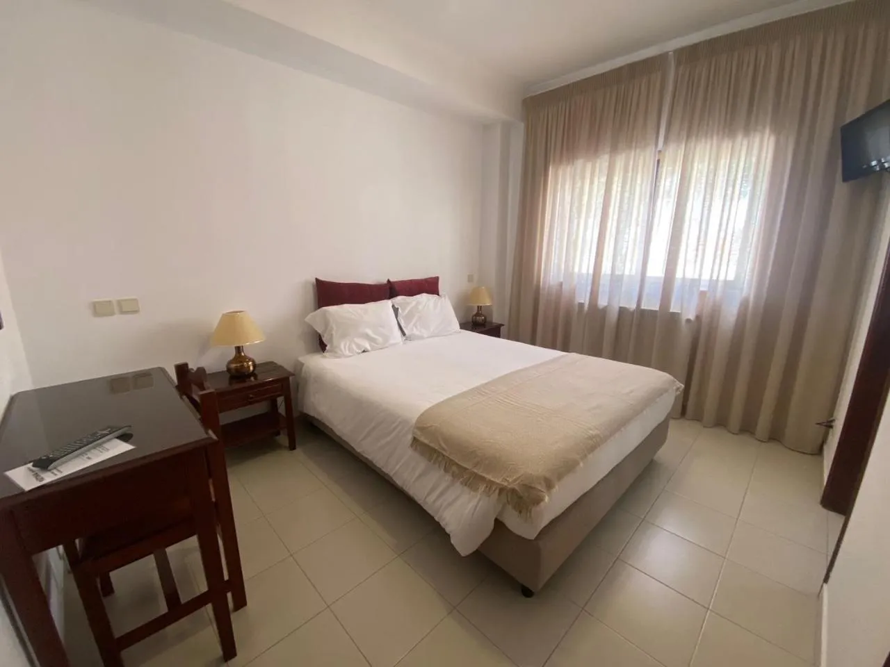 Bed in Fátima GuestHouse