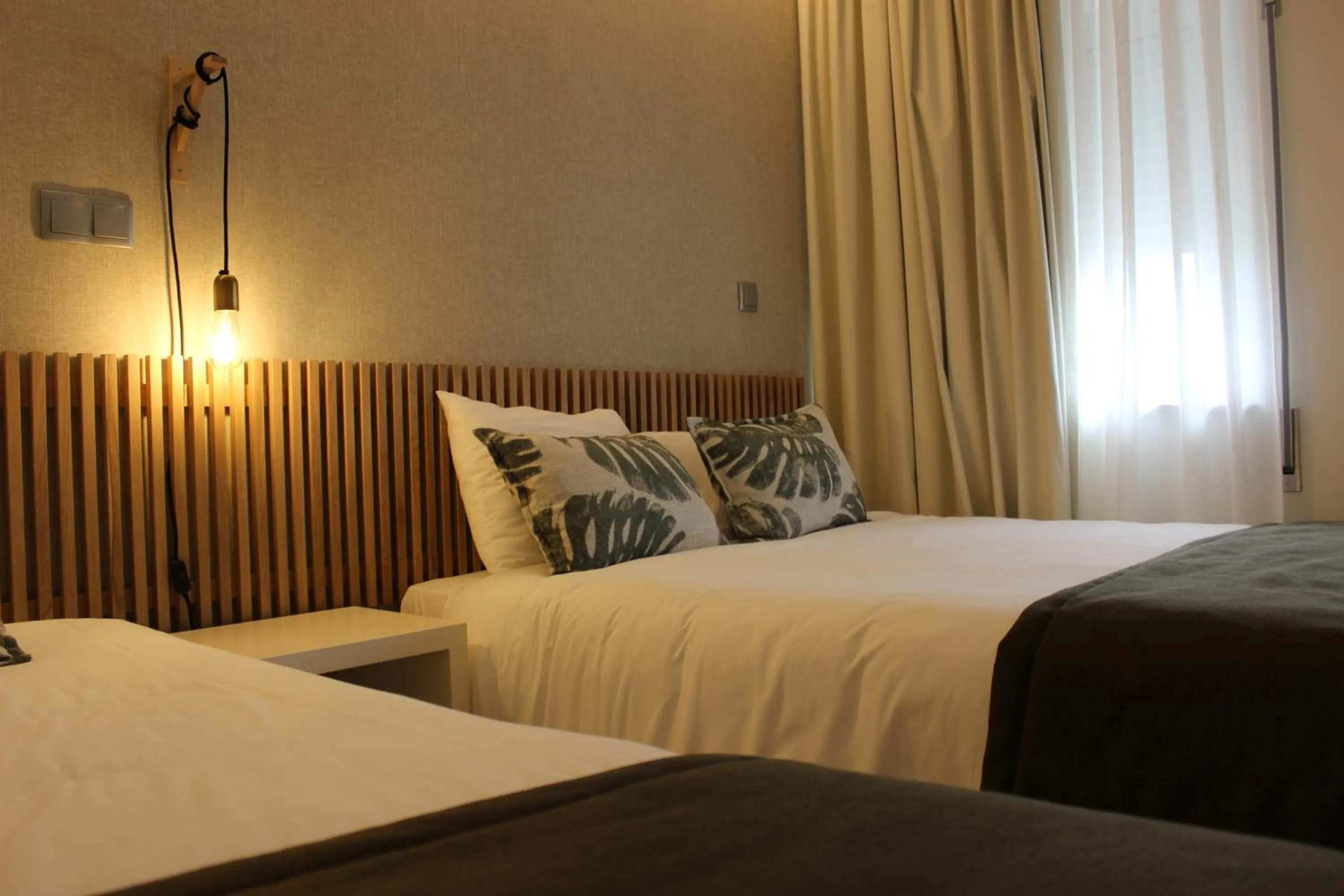 Bed in Fátima GuestHouse