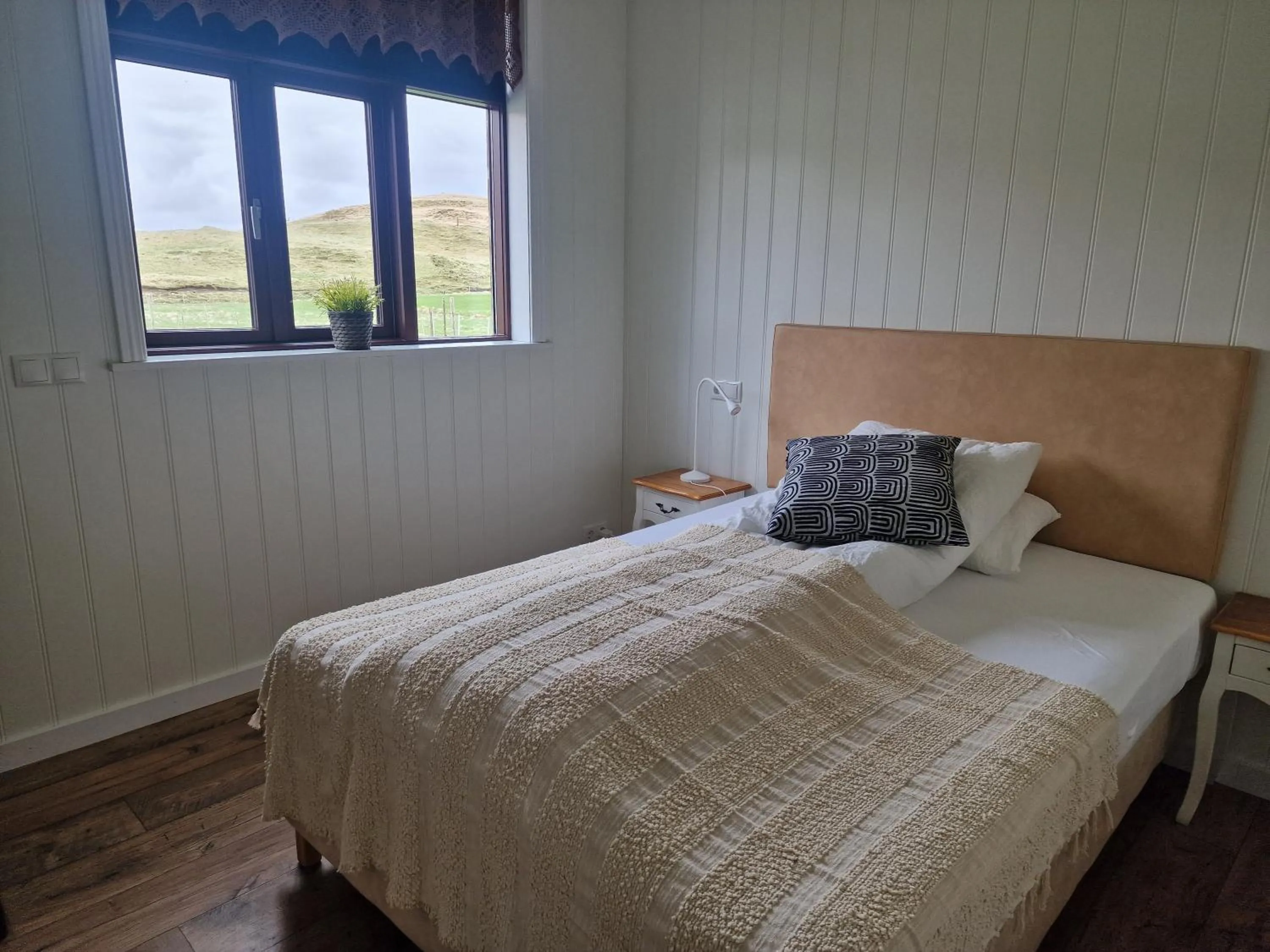 Bed in Sólheimahjáleiga Guesthouse