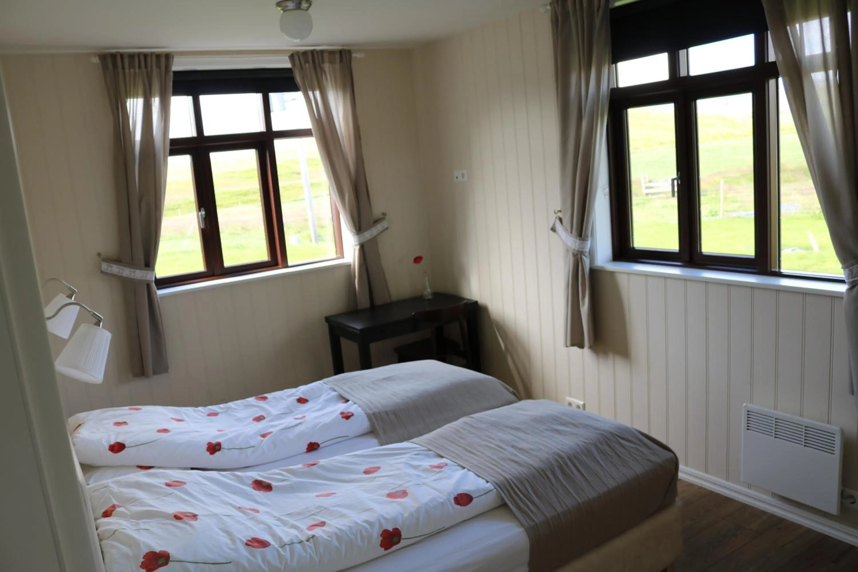 Bed in Sólheimahjáleiga Guesthouse