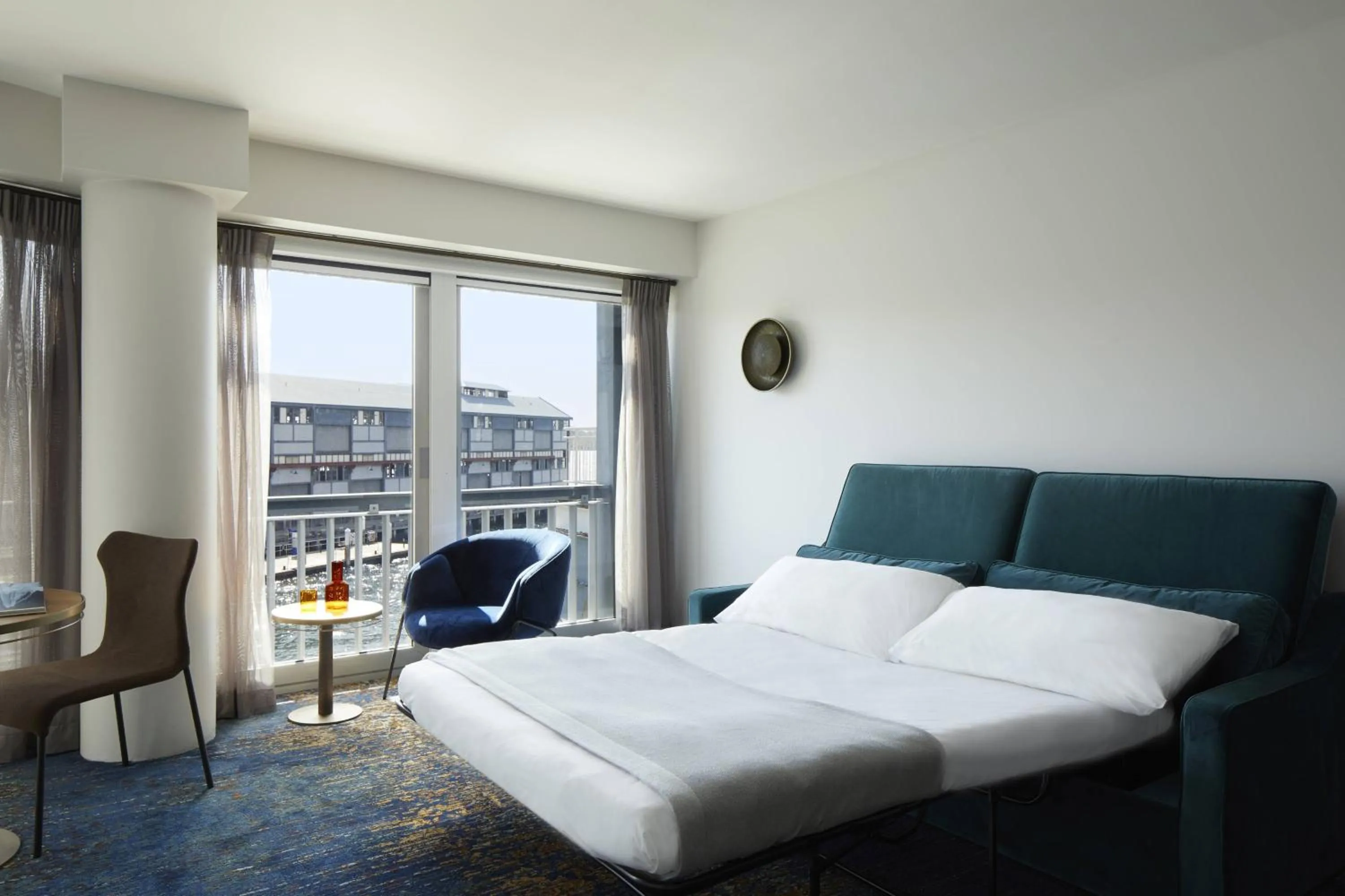 Photo of the whole room, Bed in Pier One Sydney Harbour, Autograph Collection