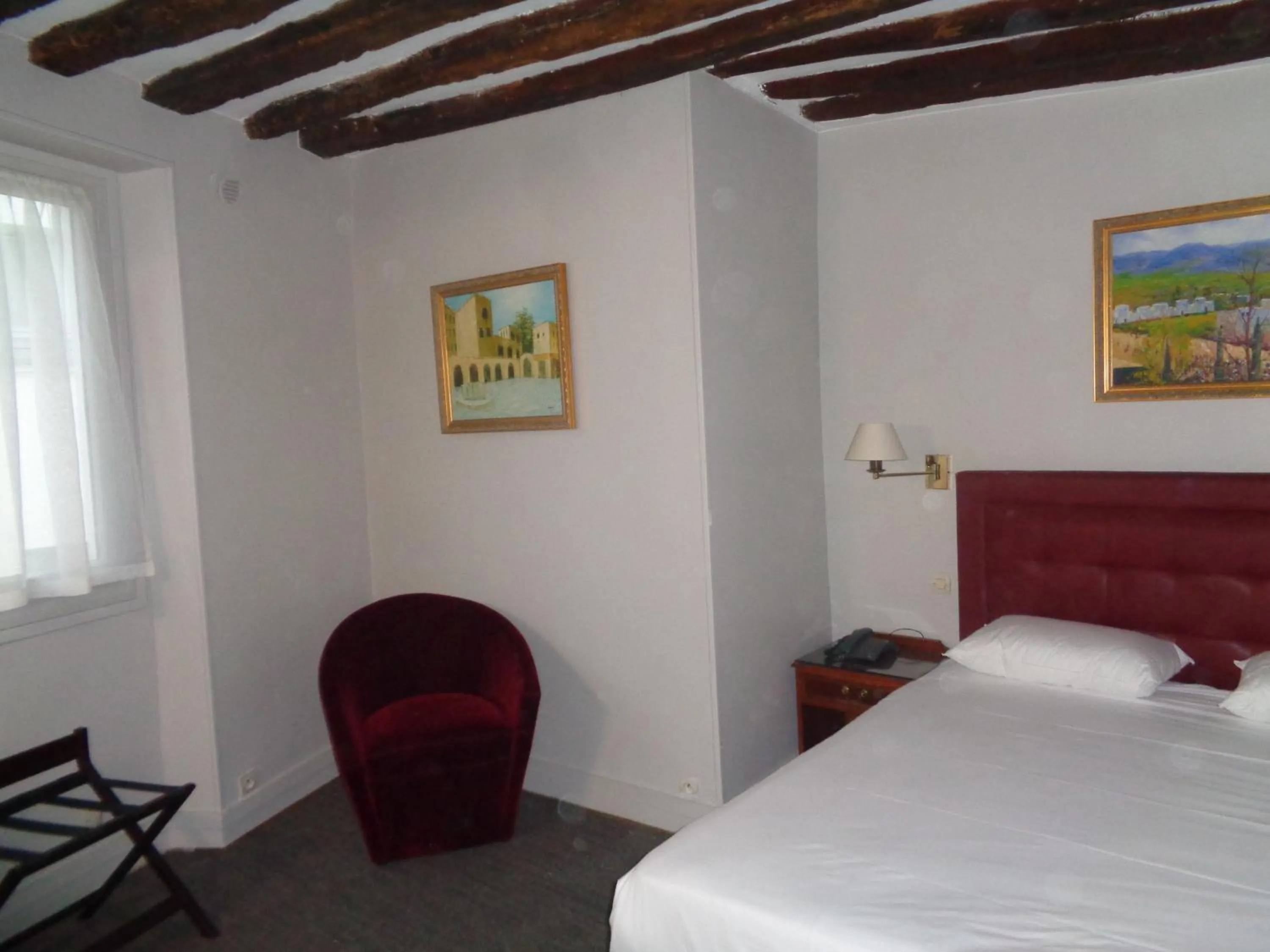 Photo of the whole room, Bed in Hôtel les Degrés de Notre Dame