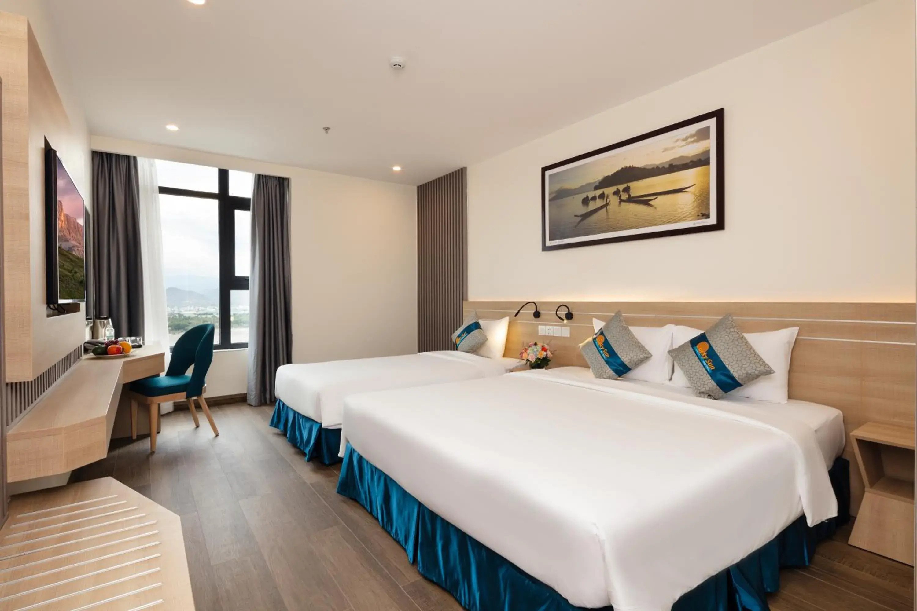 Deluxe Triple Room with City View in Lucky Sun Hotel Nha Trang Beach Deluxe Triple Room with City View in Lucky Sun Hotel Nha Trang Beach