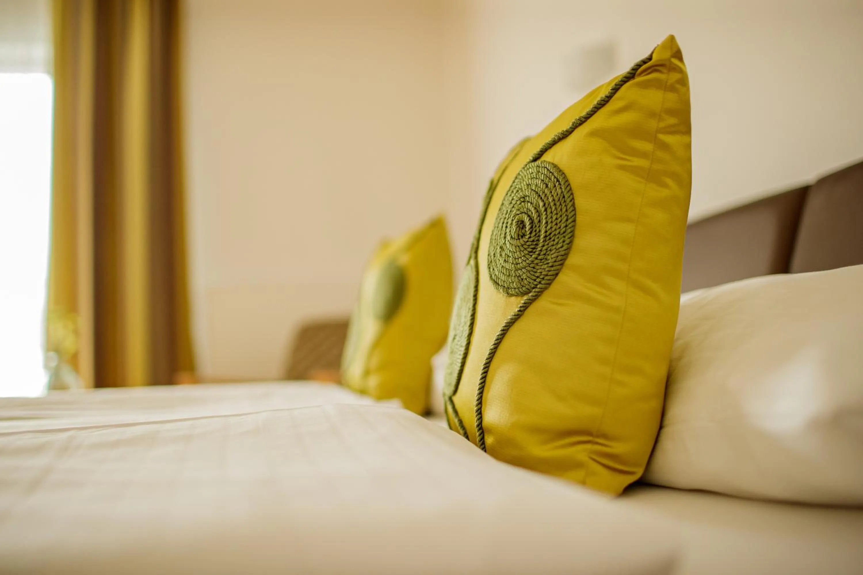 Bed in Hotel Garni Toscanina - Adults Only