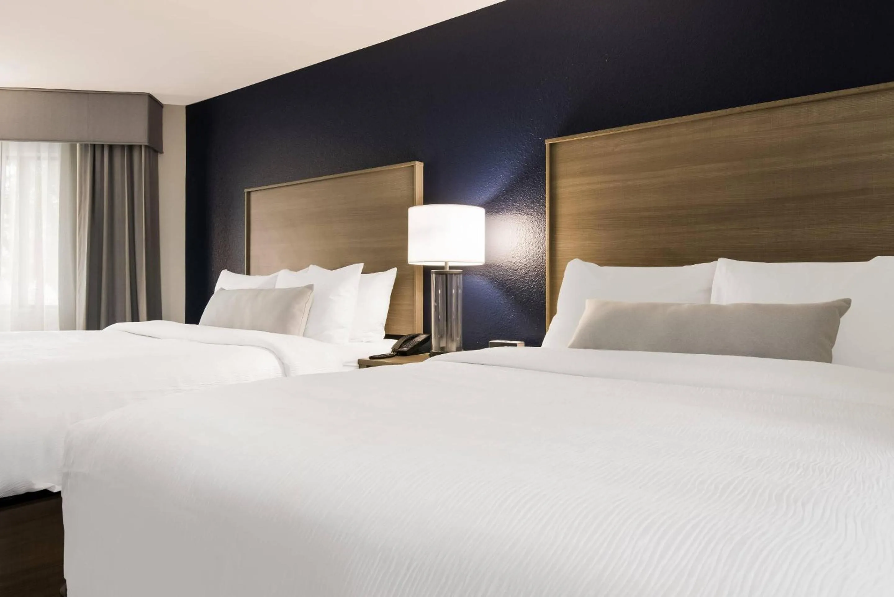 Bedroom, Bed in The Inn on Maritime Bay, an Ascend Collection Hotel